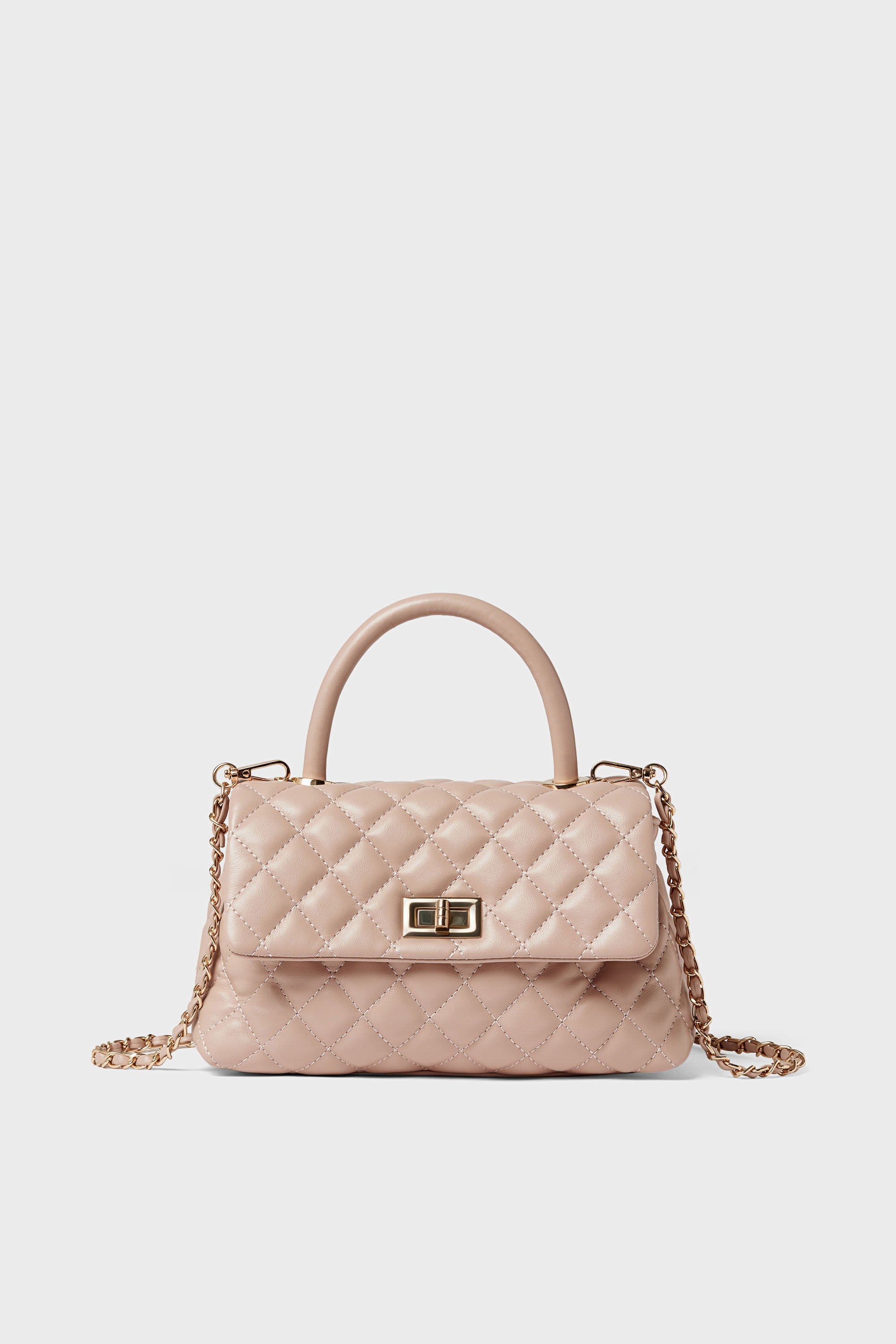 A close-up of the Urban Expressions quilted crossbody bag, an elegant animal-friendly handbag crafted from vegan leather.