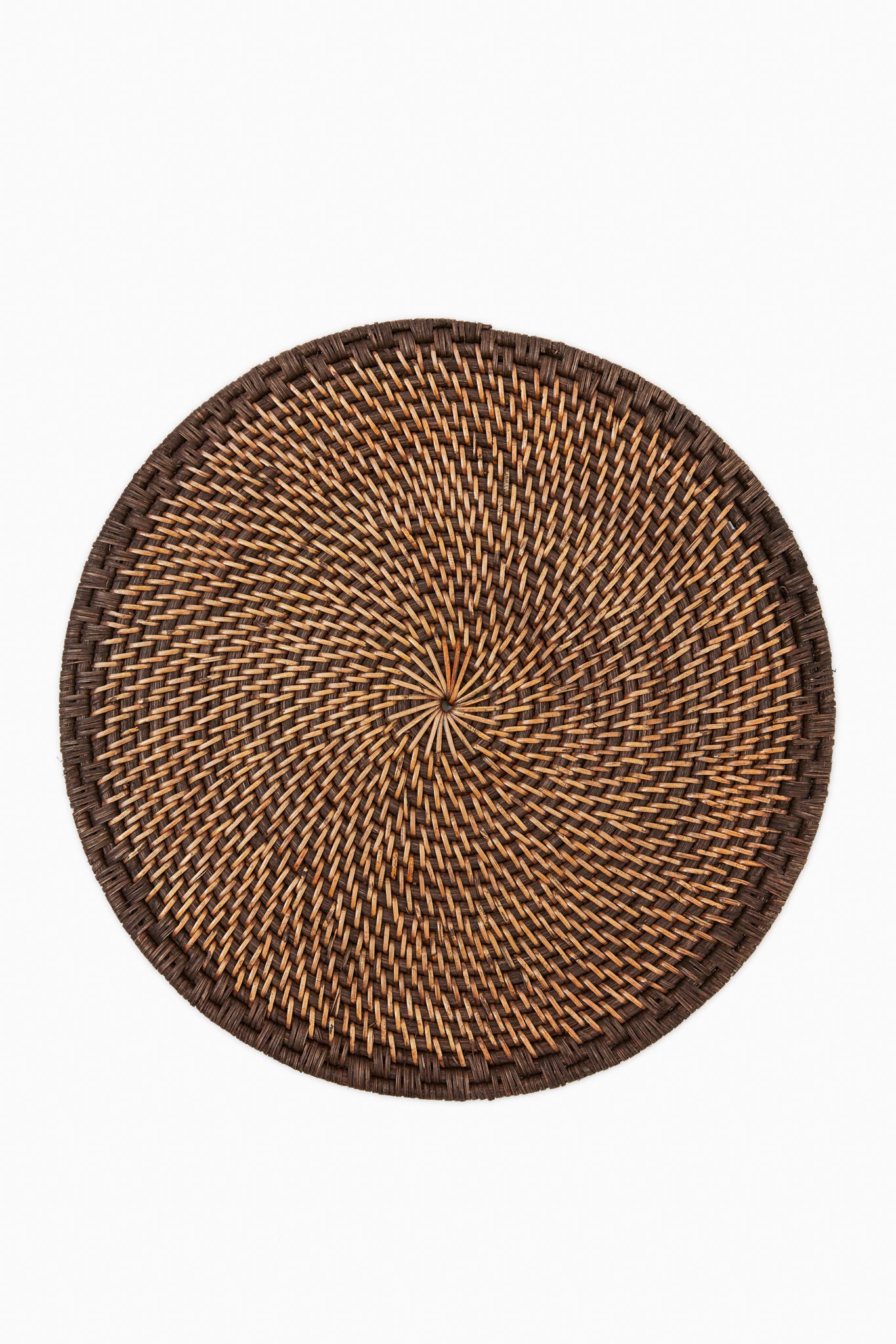 Caton's Wharf round woven rattan placemat features a brown and tan pattern, crafted in natural tones.