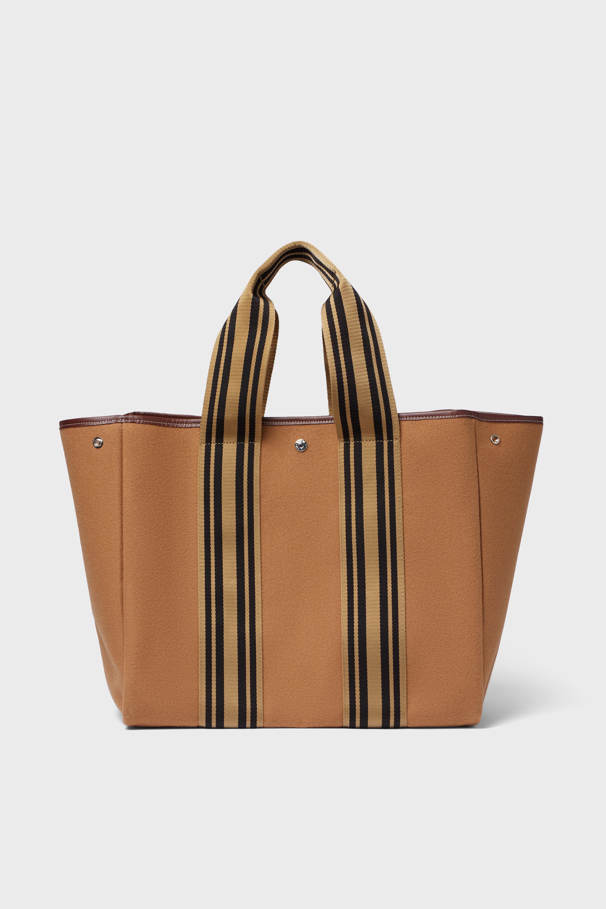 The Rue de Verneuil large tan tote bag is crafted from wool flannel with black and brown vertical stripes, silver side studs, and a structured open-top design—a chic luxury piece for your collection.