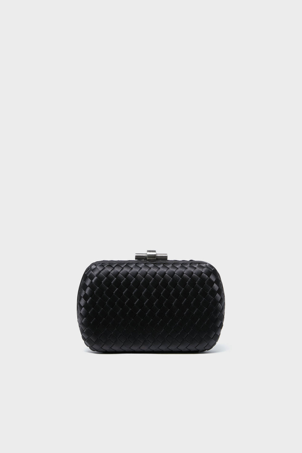 The Olga Berg small black woven clutch features a metallic clasp, making it perfect as an evening bag or a special occasion accessory.