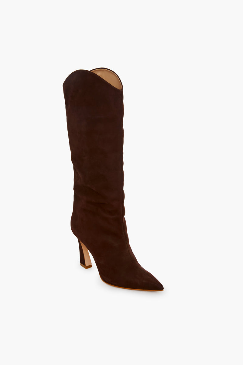 A single Schutz Maryana Flare Boot in chocolate nubuck is shown, featuring a pointed toe and mid-height block heel.