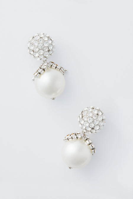 Tuckernuck Jewelry dangle earrings with round white pearls and clusters of clear gemstones add an elegant touch to any outfit.