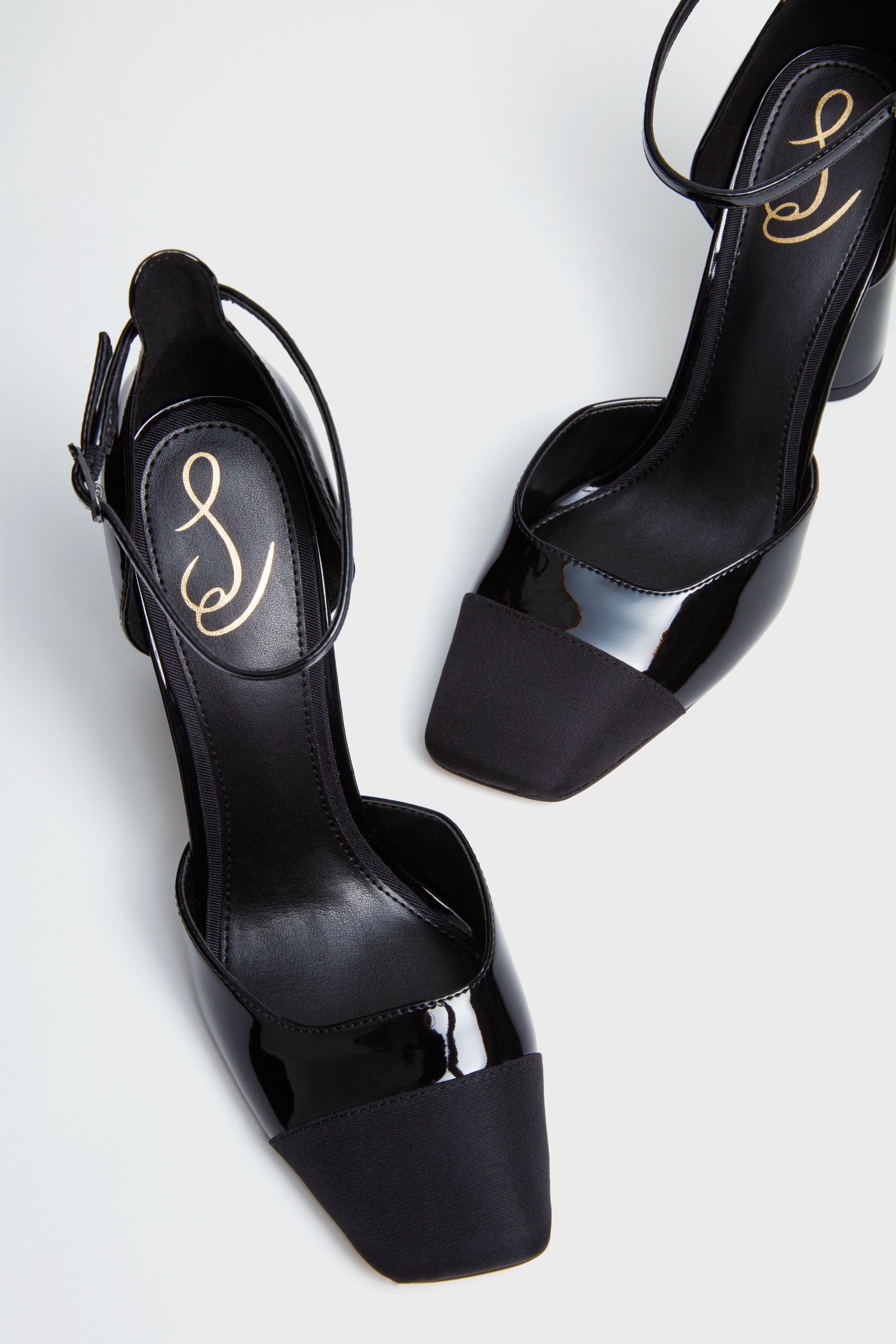 Buy Rocia Black shimmer cross strap block heels for Women Online at Regal  Shoes |1277308