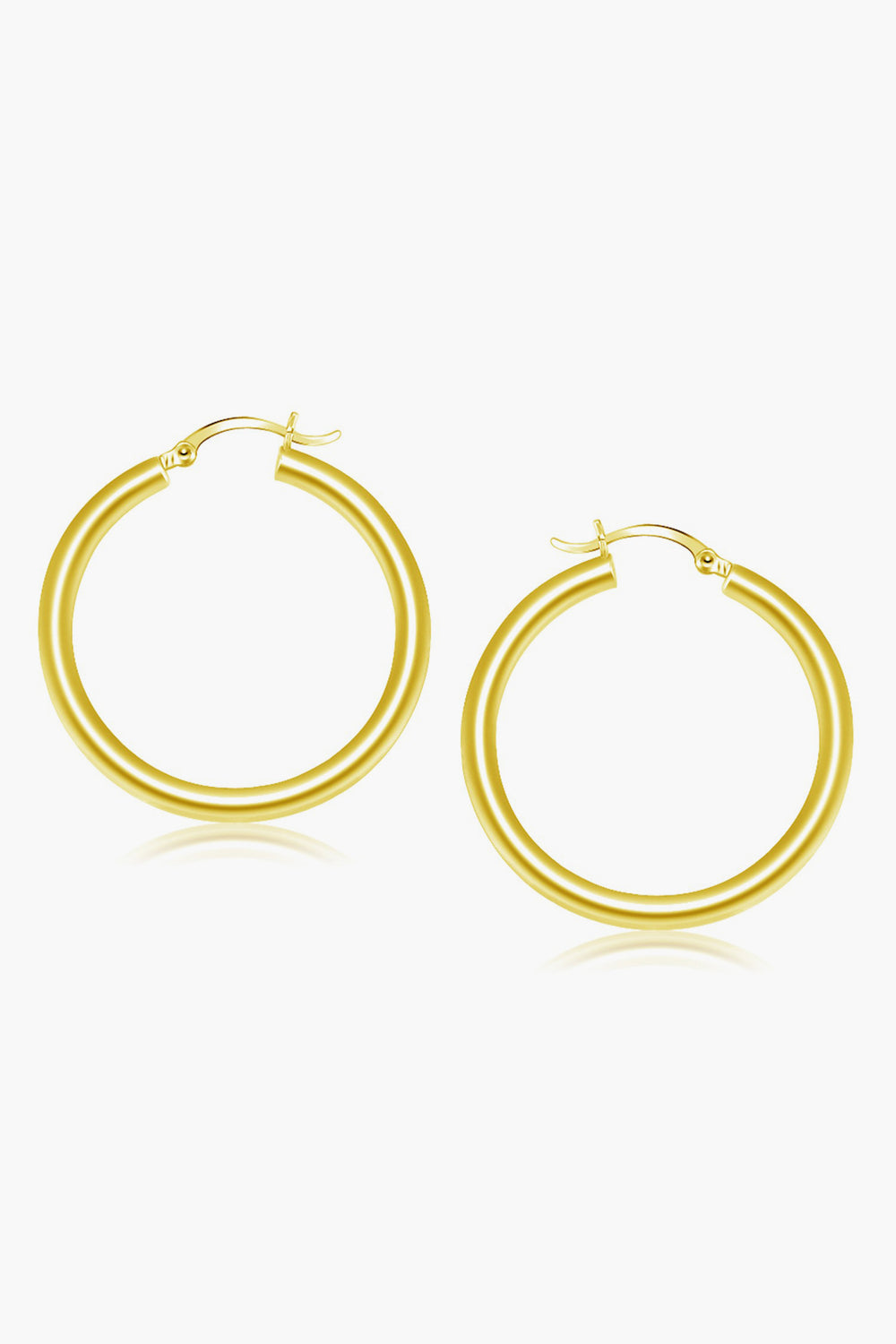 A pair of classic 14k gold hoop earrings from Tuckernuck Fine Jewelry with latch-back closures, perfect for adding a timeless touch to any look.