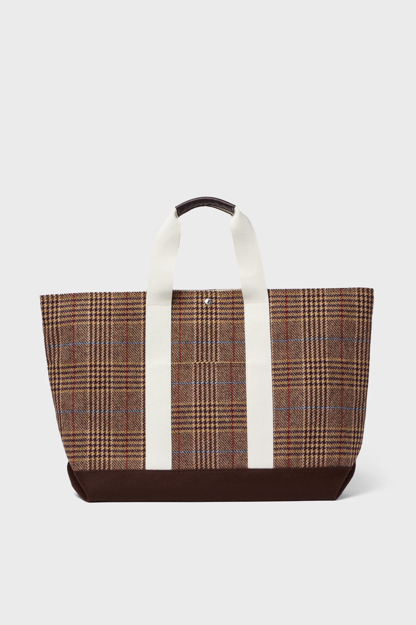 The Rue de Verneuil brown plaid wool tote features white handles and a dark brown base, making it a stylish weekender bag.