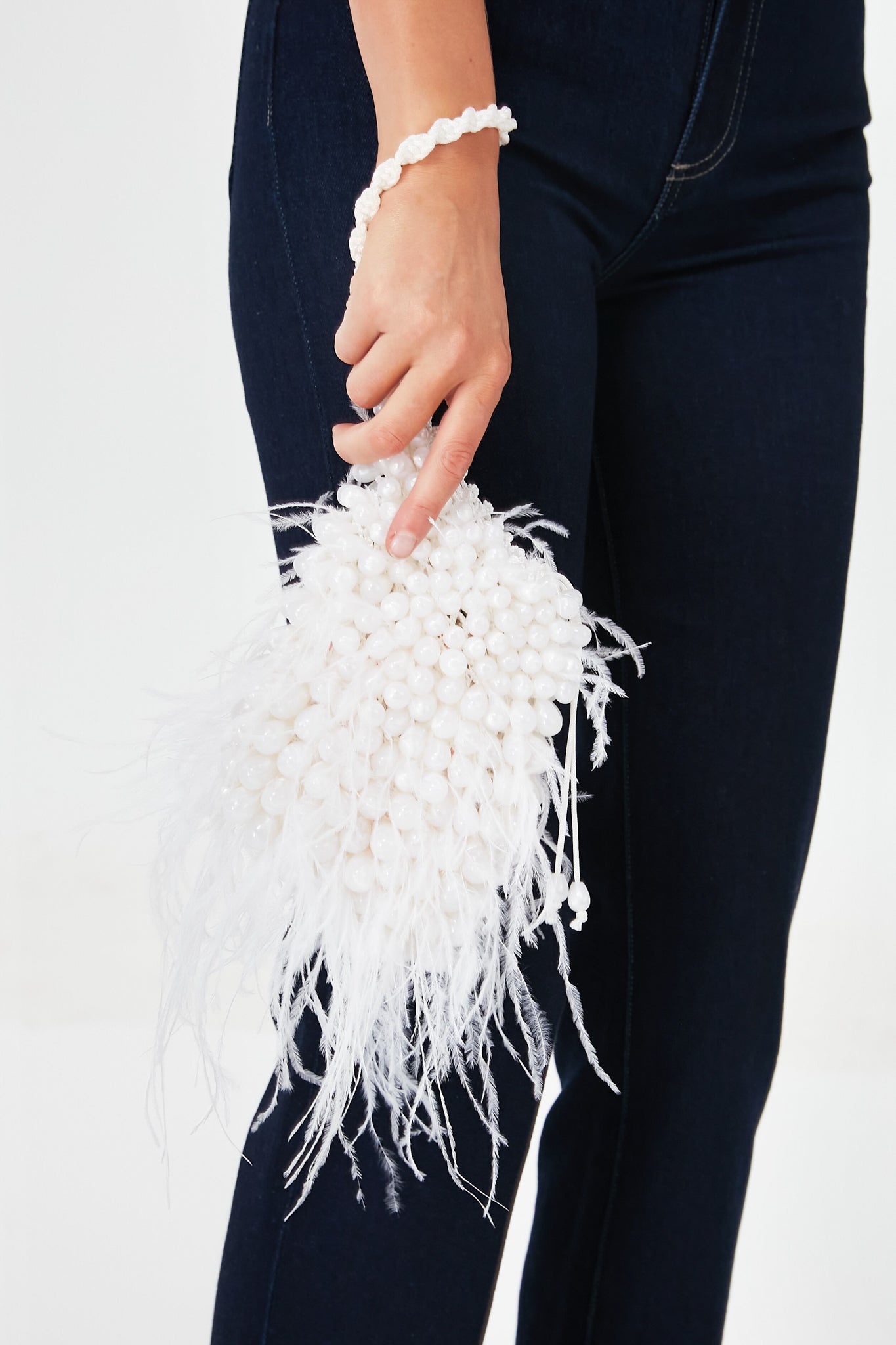Pearl Dora Feather Wristlet