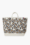The KULE Large Leopard Tote features short handles, a beige, brown, and black print, and a small blue and red tab on the upper edge—perfect as a stylish daily carry-all.