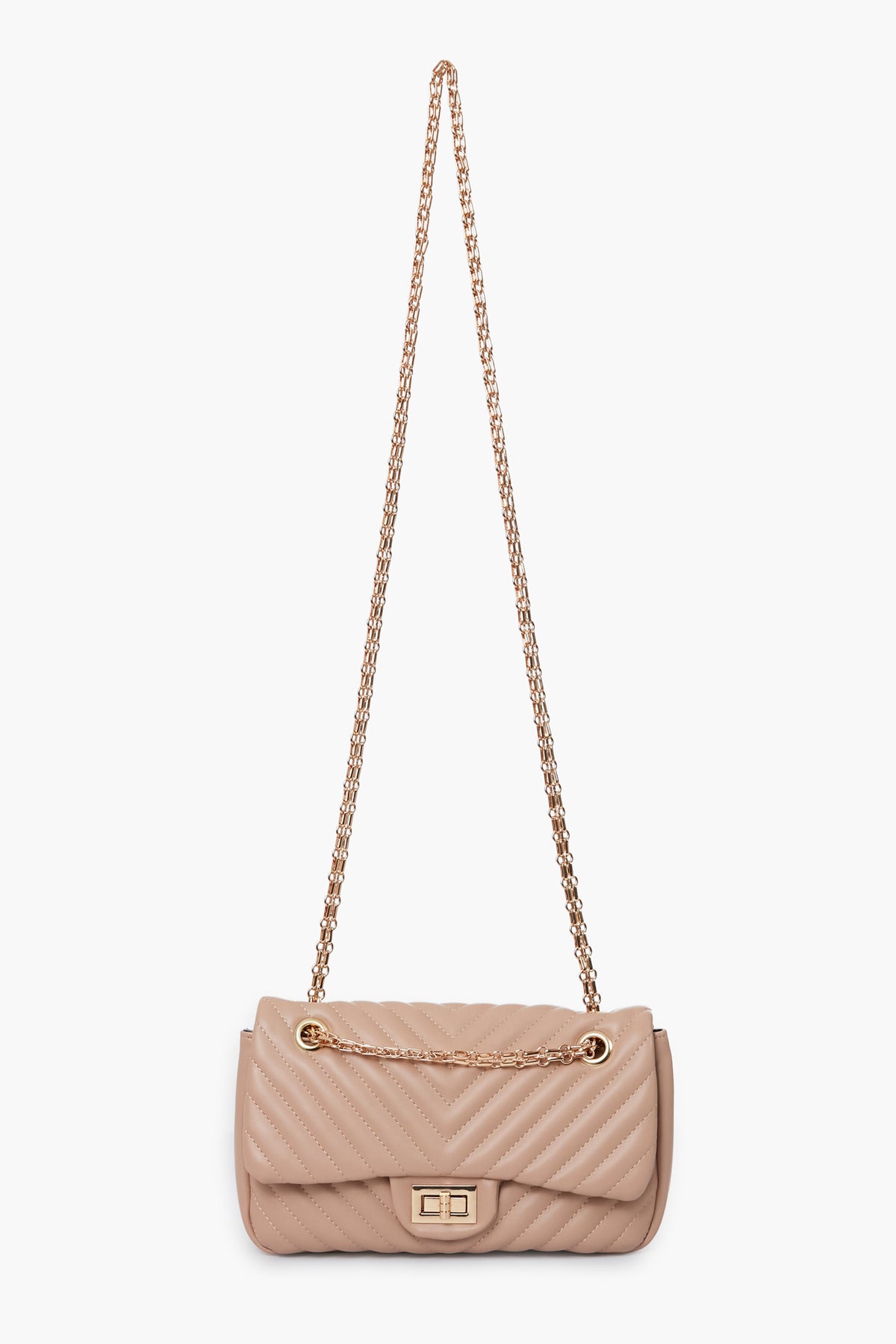 Urban Expressions beige quilted vegan handbag features a gold chain strap and a rectangular gold clasp on the front flap.