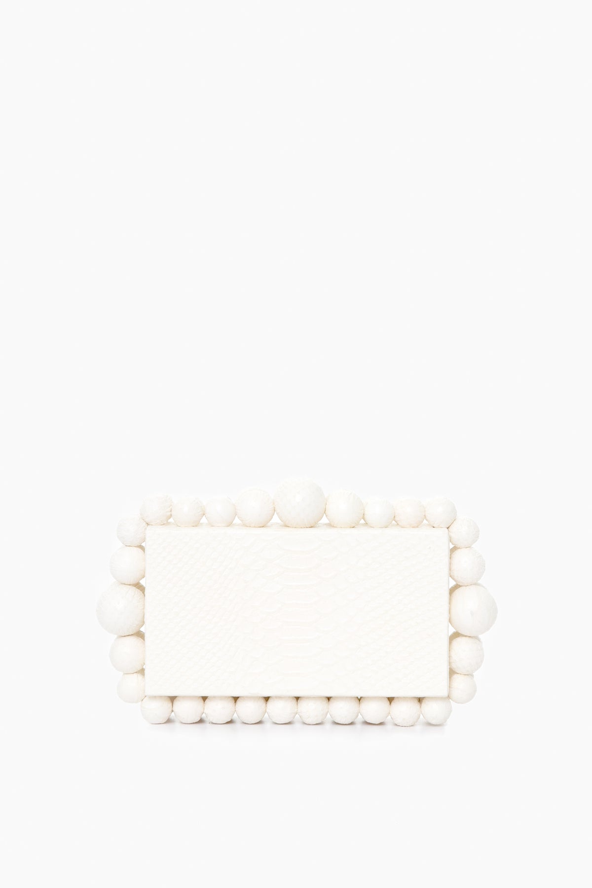 A white rectangular Cult Gaia box clutch with a textured, snakeskin-embossed leather surface and large round beads accenting the edges.