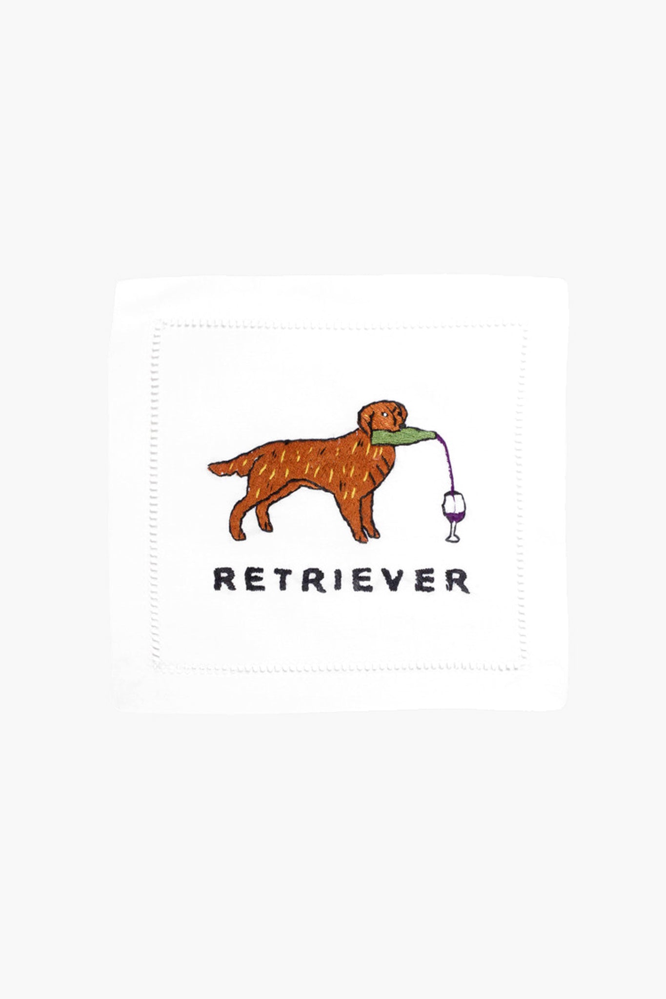 An August Morgan cloth cocktail napkin, embroidered with a brown retriever holding a bottle and green leaf, plus "RETRIEVER" text—perfect hostess gift.