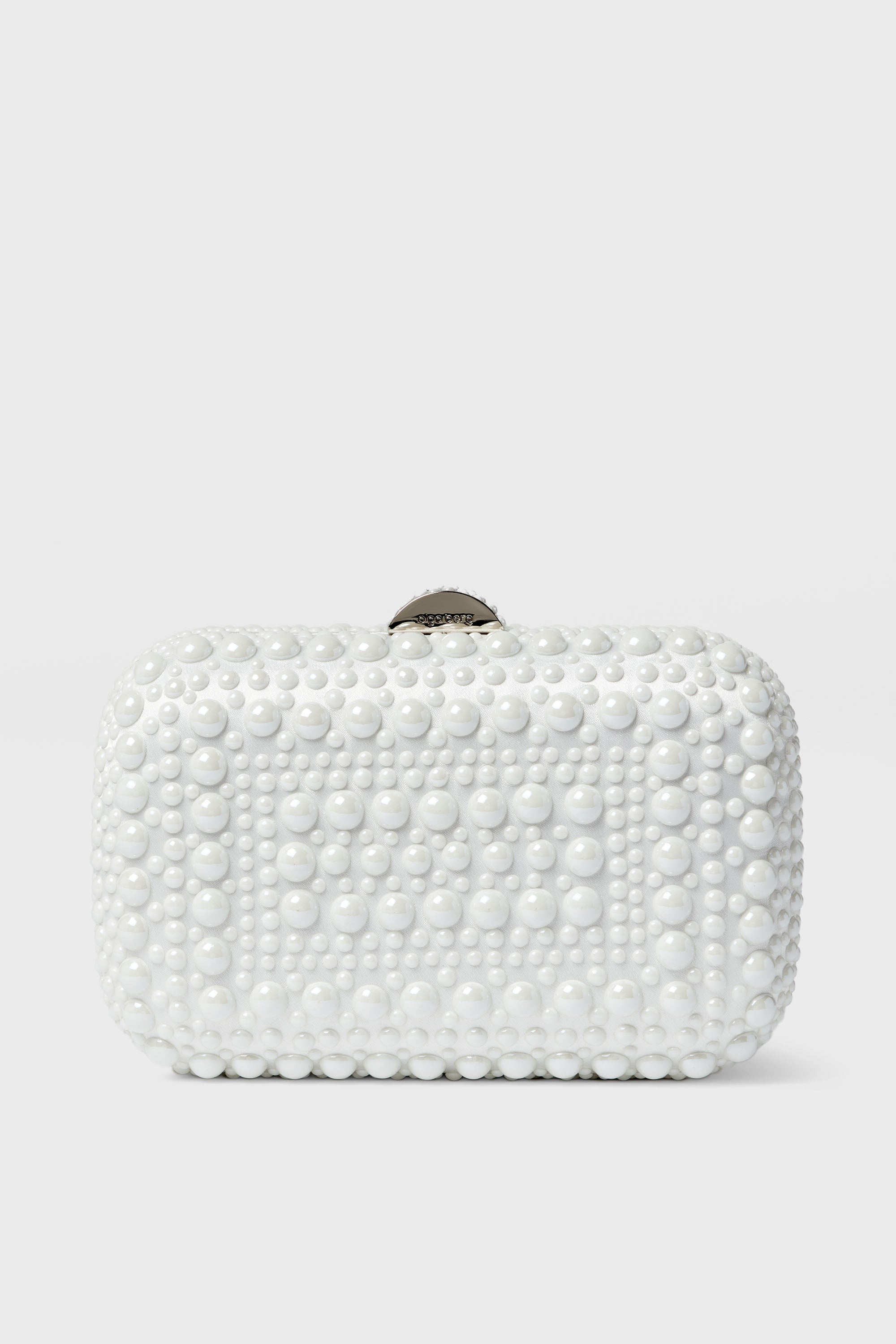 The Olga Berg rectangular white clutch, featuring a textured pattern of raised round beads, is an elegant choice for evening bags and special occasions.