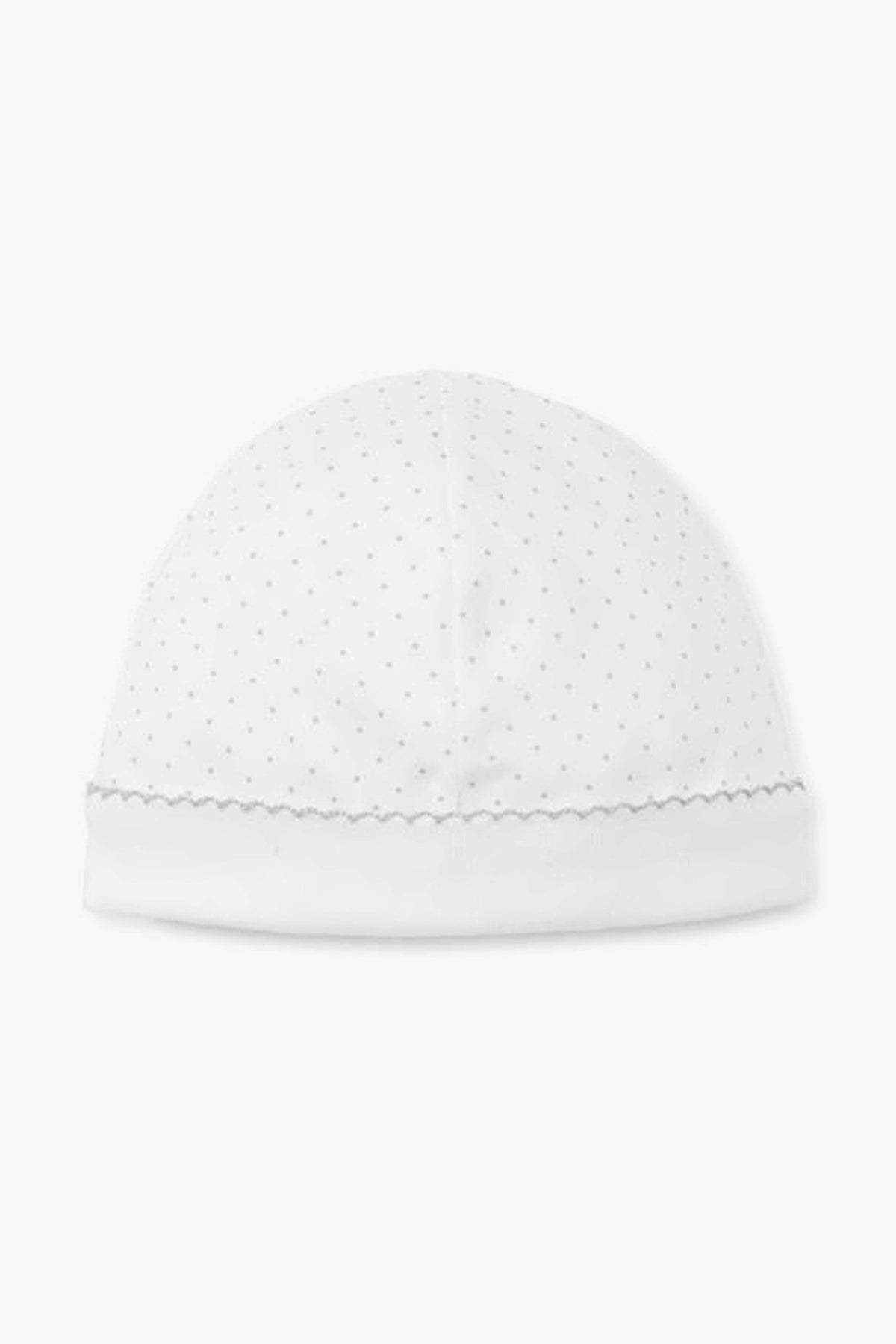 The kissy kissy white baby hat is crafted from soft Pima cotton, accented with small gray polka dots and a scalloped edge along the bottom.