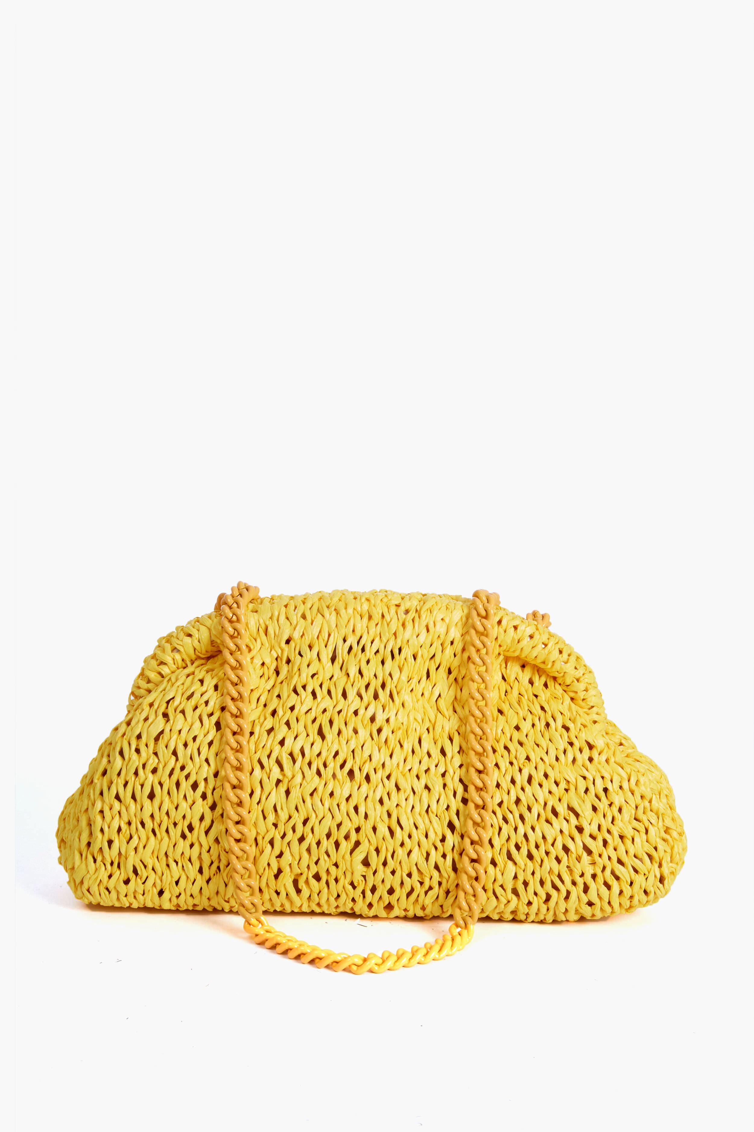 A yellow handwoven raffia bag by Maria La Rosa, featuring a braided shoulder strap and Italian craftsmanship in a stylish design.