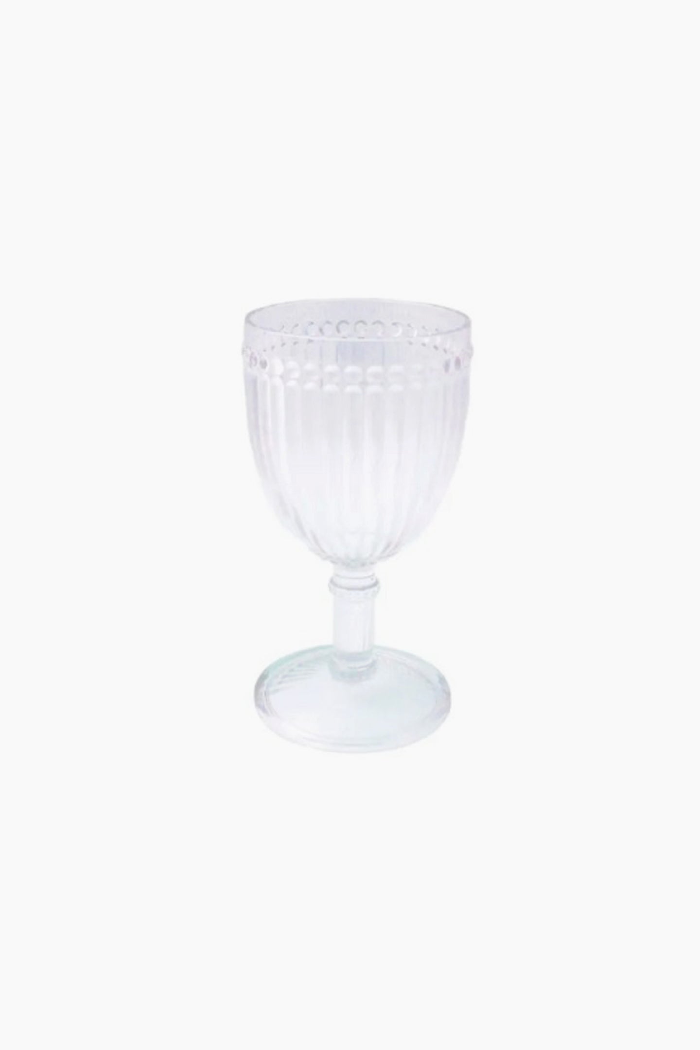 The Le Cadeaux clear glass goblet features a textured, ribbed bowl and round base, crafted from unbreakable glassware for extra durability and is dishwasher safe for easy cleaning.