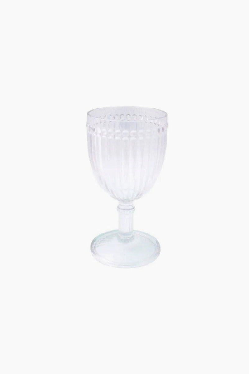 The Le Cadeaux clear glass goblet features a textured, ribbed bowl and round base, crafted from unbreakable glassware for extra durability and is dishwasher safe for easy cleaning.