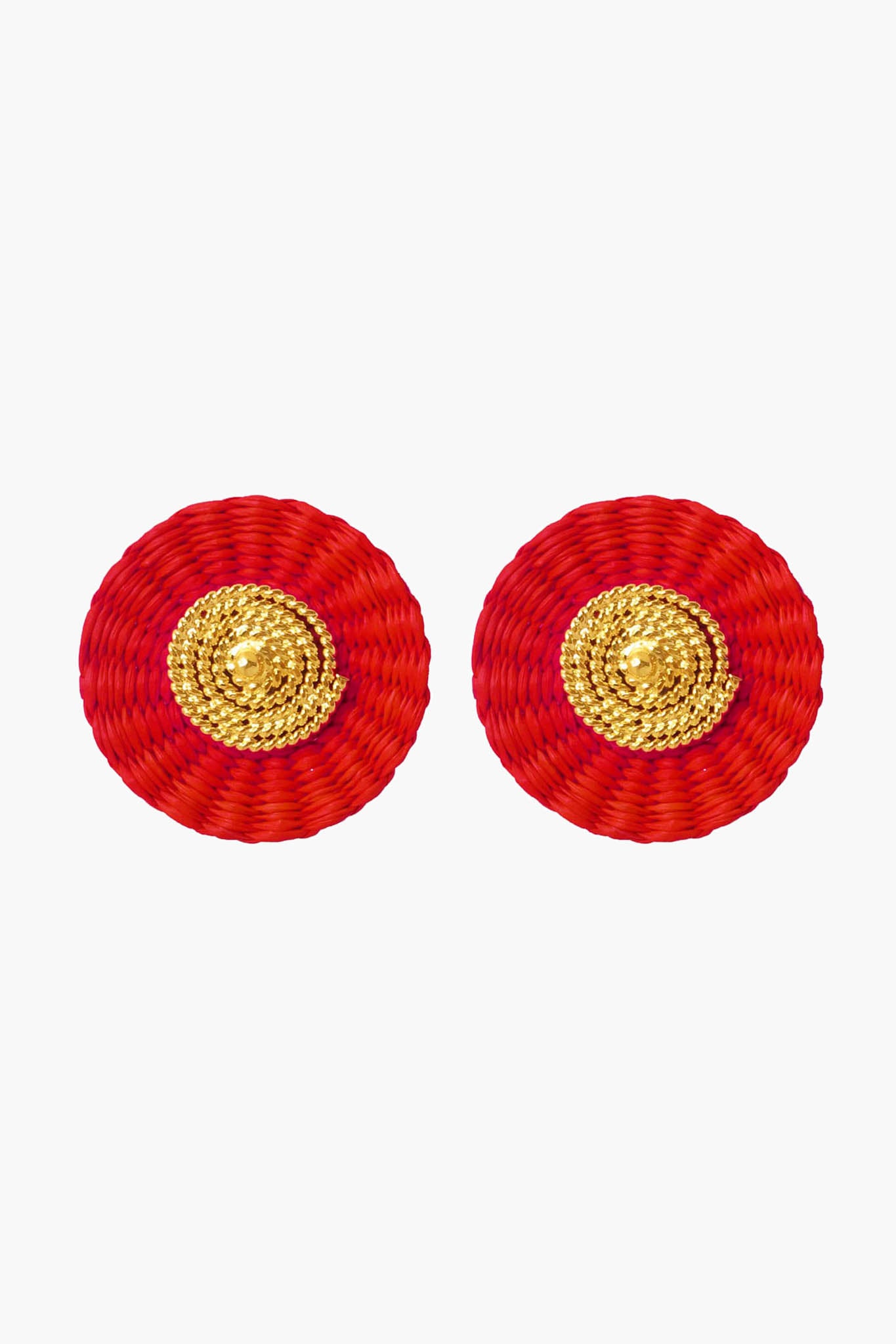 Ana Carolina Valencia's round handmade earrings feature a red woven outer circle and a textured gold-plated center—ideal for lovers of contemporary jewelry.