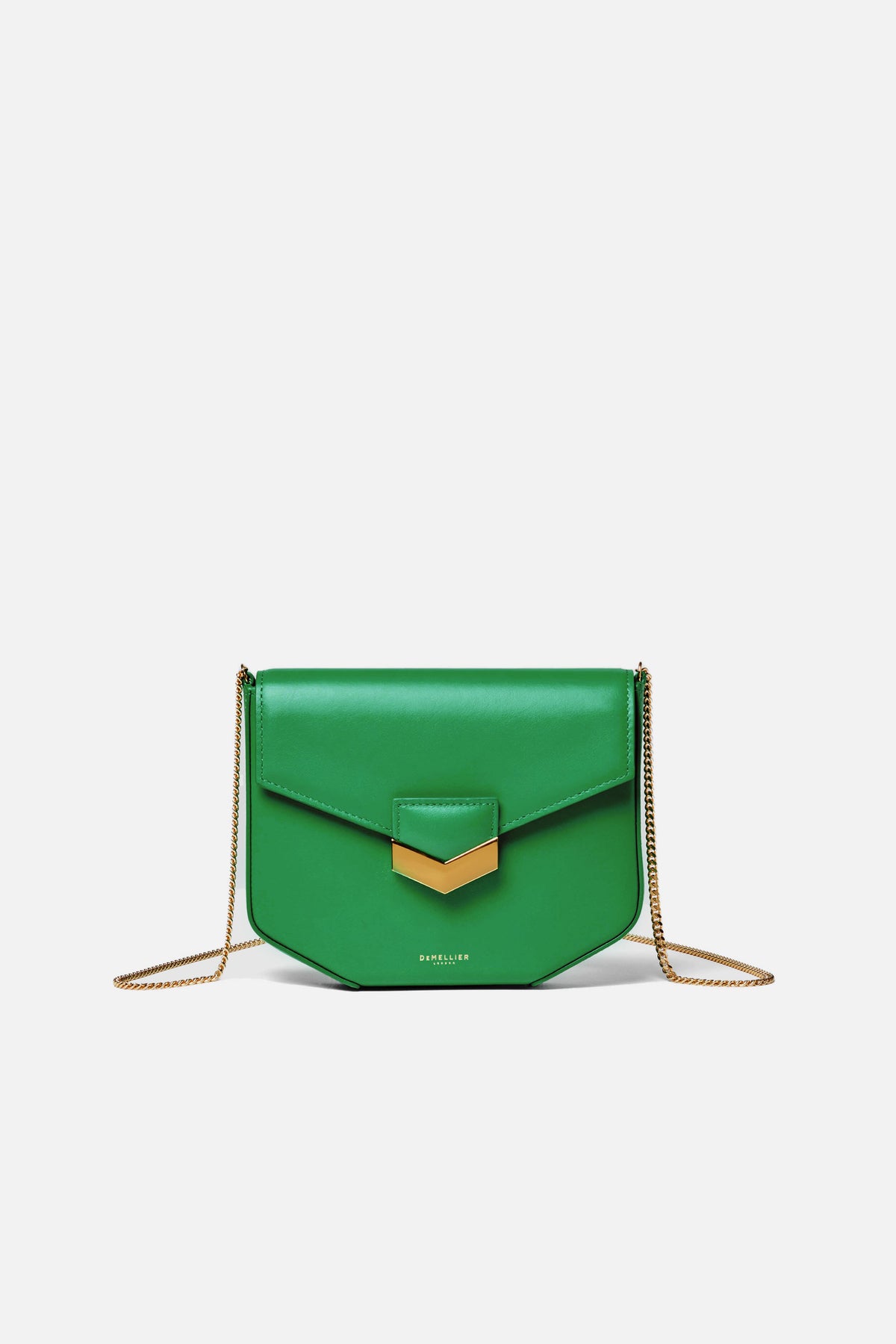 A green leather Demellier Emerald London crossbody bag with a gold chain strap and geometric clasp—perfect for women’s accessories and handcrafted handbag lovers.