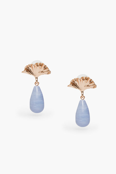 Mignonne Gavigan gold-plated earrings feature fan-shaped Gingko leaf tops and teardrop blue lace agate stone pendants.