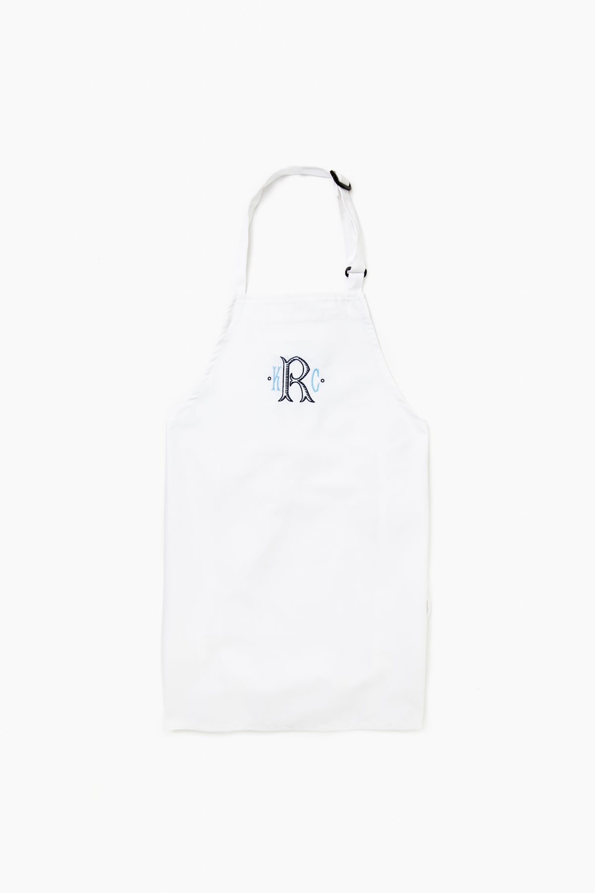 The Caton's Wharf white adjustable neck apron features a blue letter R monogram on the chest and is crafted from wrinkle-resistant fabric for durability and style.