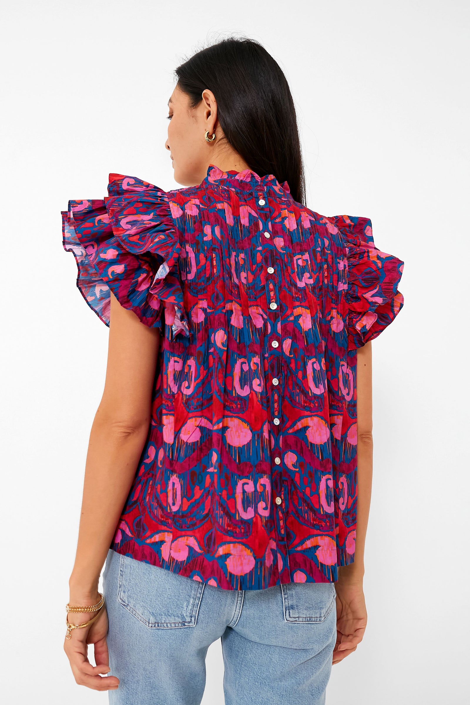 Exclusive Blue Kazak Pintuck Ruffle Top with flutter sleeves and button-down back, showcasing a classic, effortless, and fun design for a high-end, versatile look.