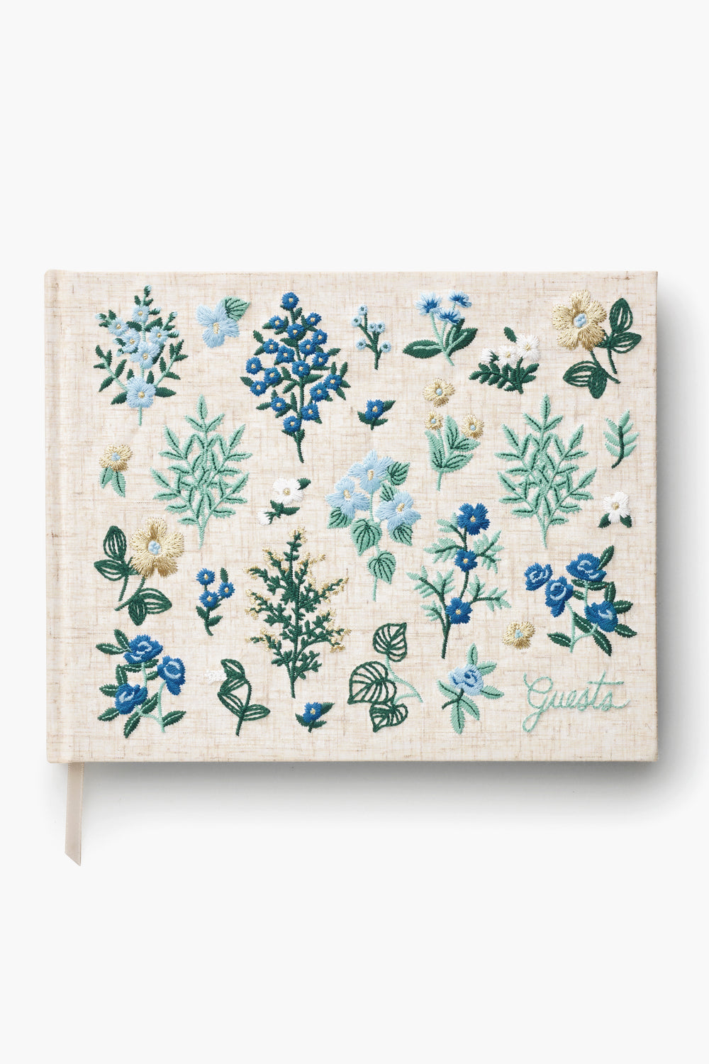 The Rifle Paper Co. beige hardcover guest book, titled "Guests," features green lettering and blue, green, and white floral embroidery—making it a charming keepsake for special occasions.