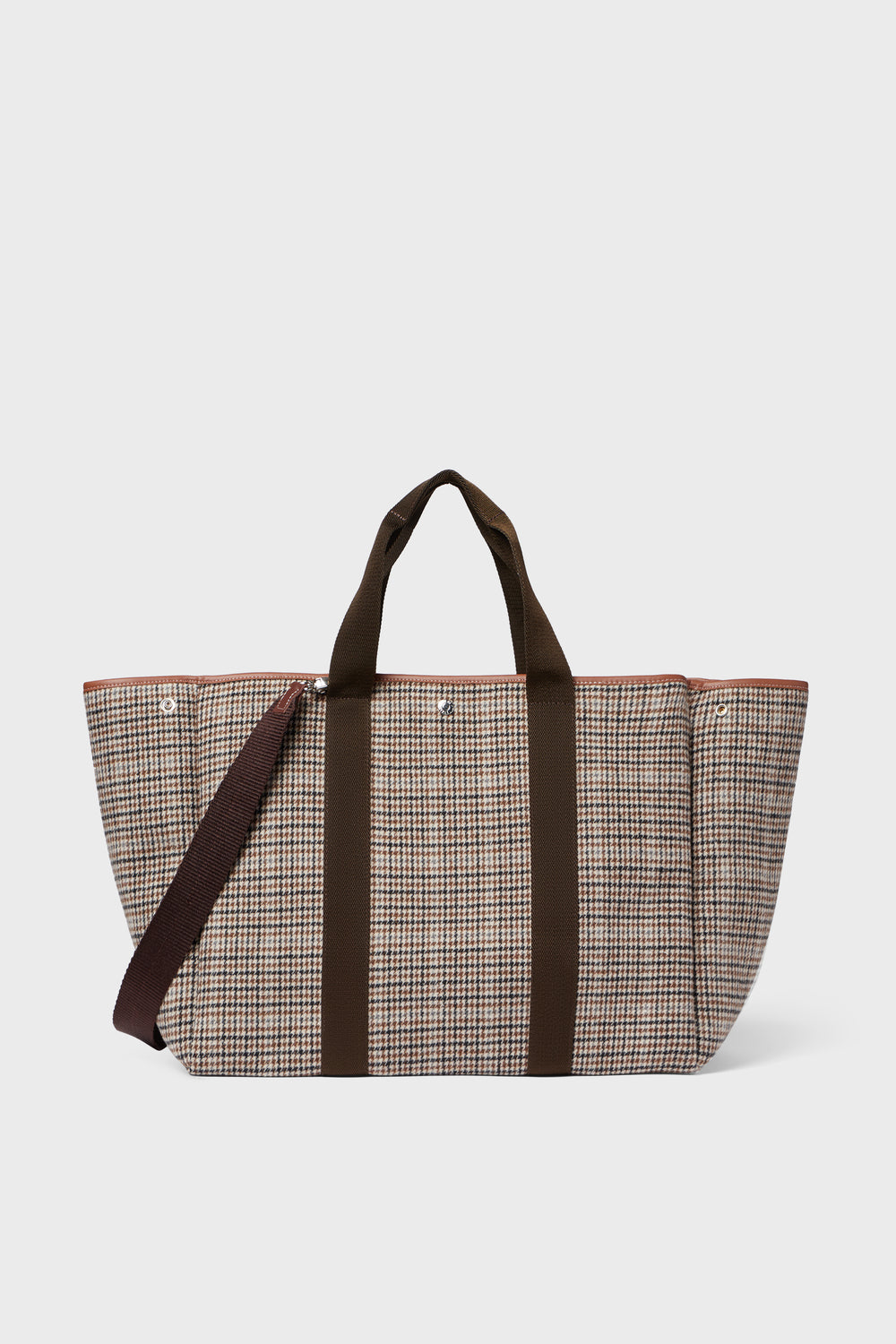 The Rue de Verneuil Camel Plaid Traversee large wool flannel tote features brown handles and a matching shoulder strap, making it ideal for luxurious luggage needs.