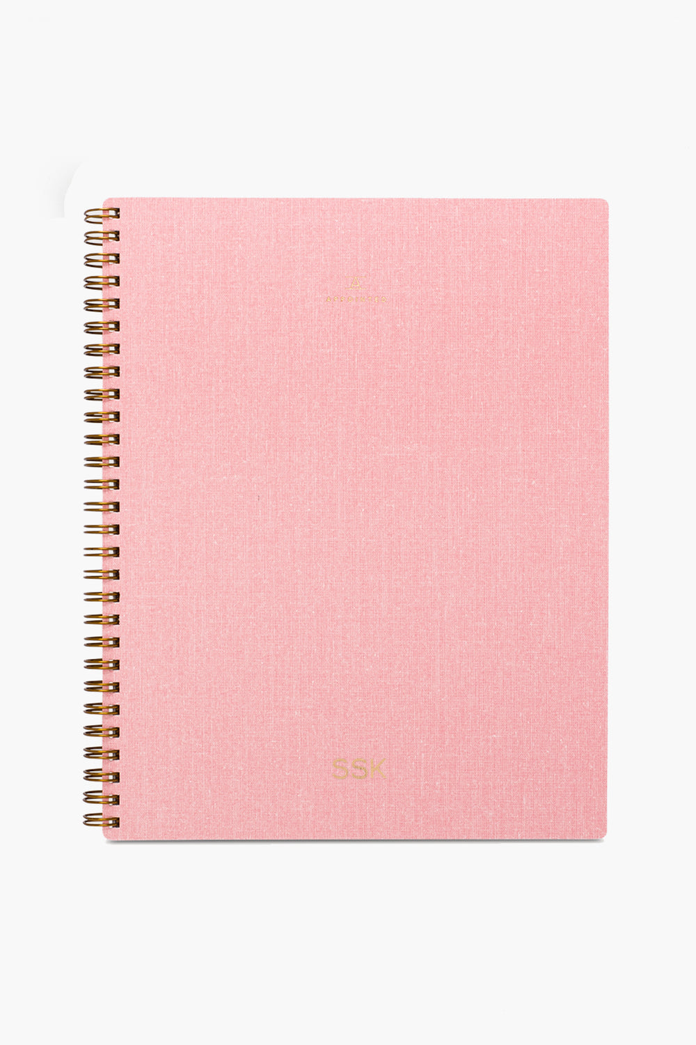 The APPOINTED Blossom Pink Lined Notebook features a textured book-cloth cover, gold lettering, spiral binding, and is crafted from recycled paper.