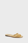 A flat, open-toe sandal from Loeffler Randall in gold metallic, featuring multiple thin straps and a chic knotted design.