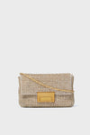 The Loeffler Randall rectangular gold crossbody clutch features a beaded exterior, glass rhinestones for added elegance, a gold chain strap, and a rectangular gold clasp.
