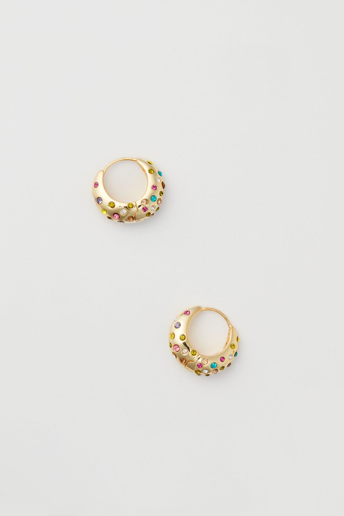 Mignonne Gavigan small gold earrings adorned with multicolor crystals and vibrant gemstone accents for a playful touch.