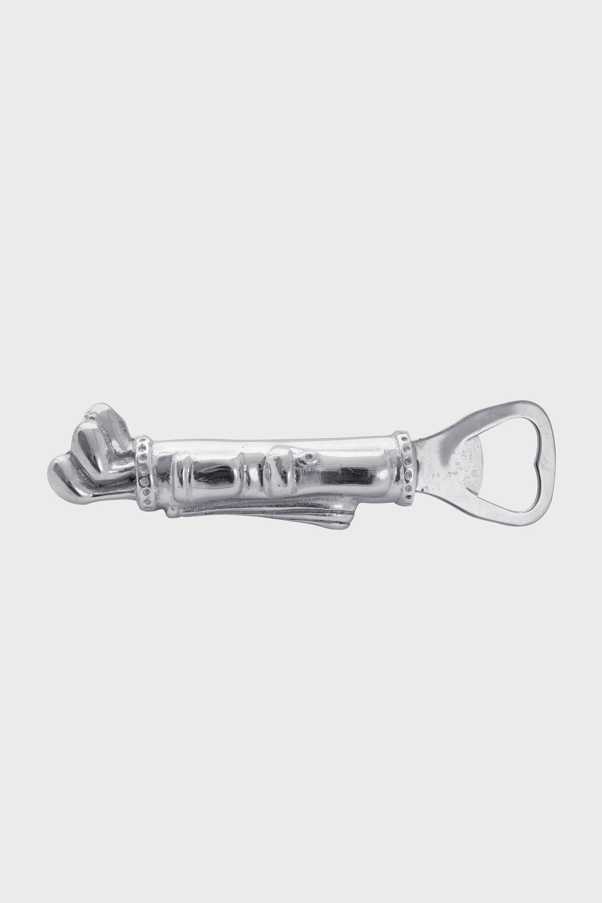 The Mariposa silver metal bottle opener is handcrafted from recycled aluminum and features a decorative handle with a sculpted face and hand design.
