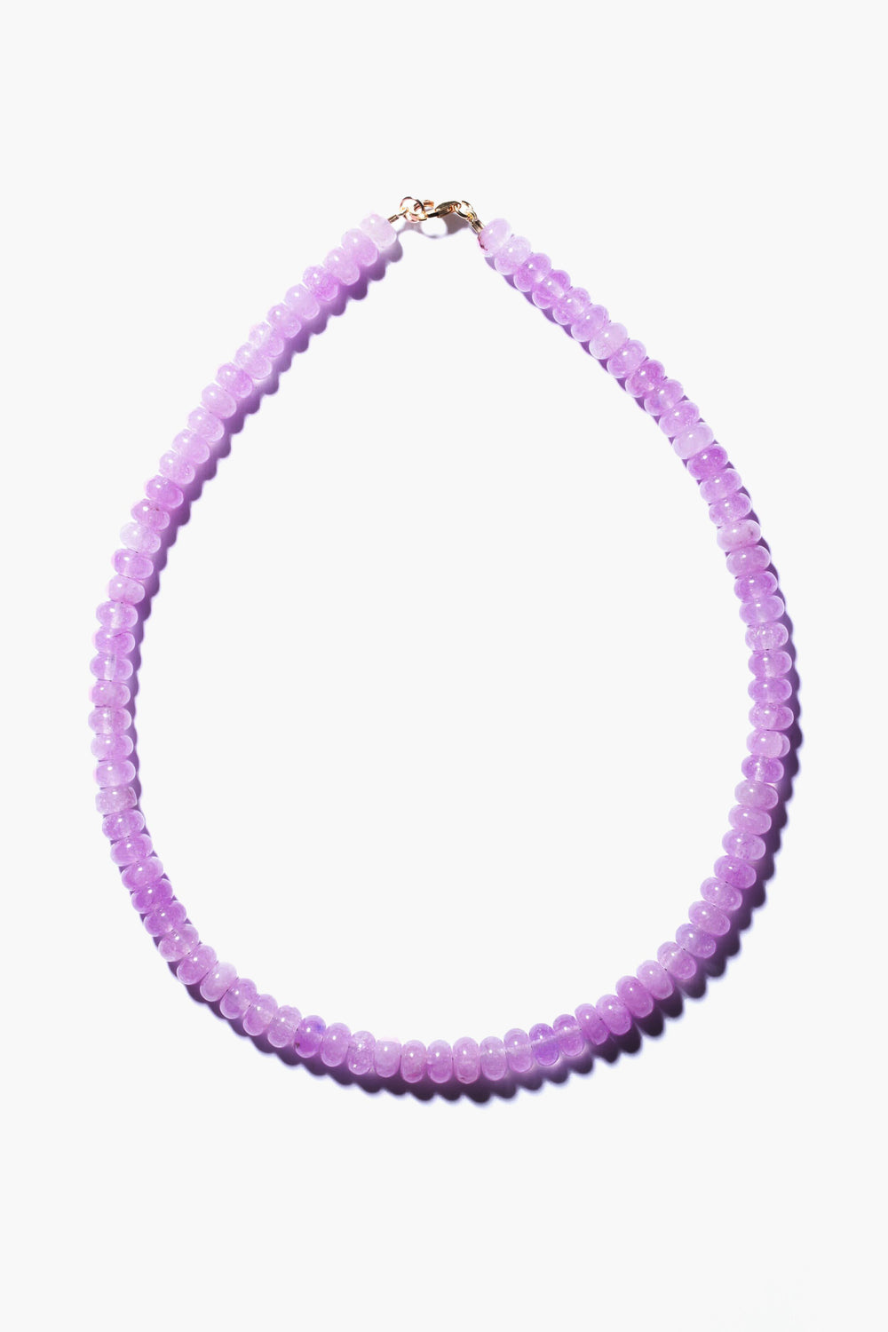 Theodosia necklace featuring round, translucent lavender beads and a gold-fill clasp, exemplifying handcrafted fine jewelry.