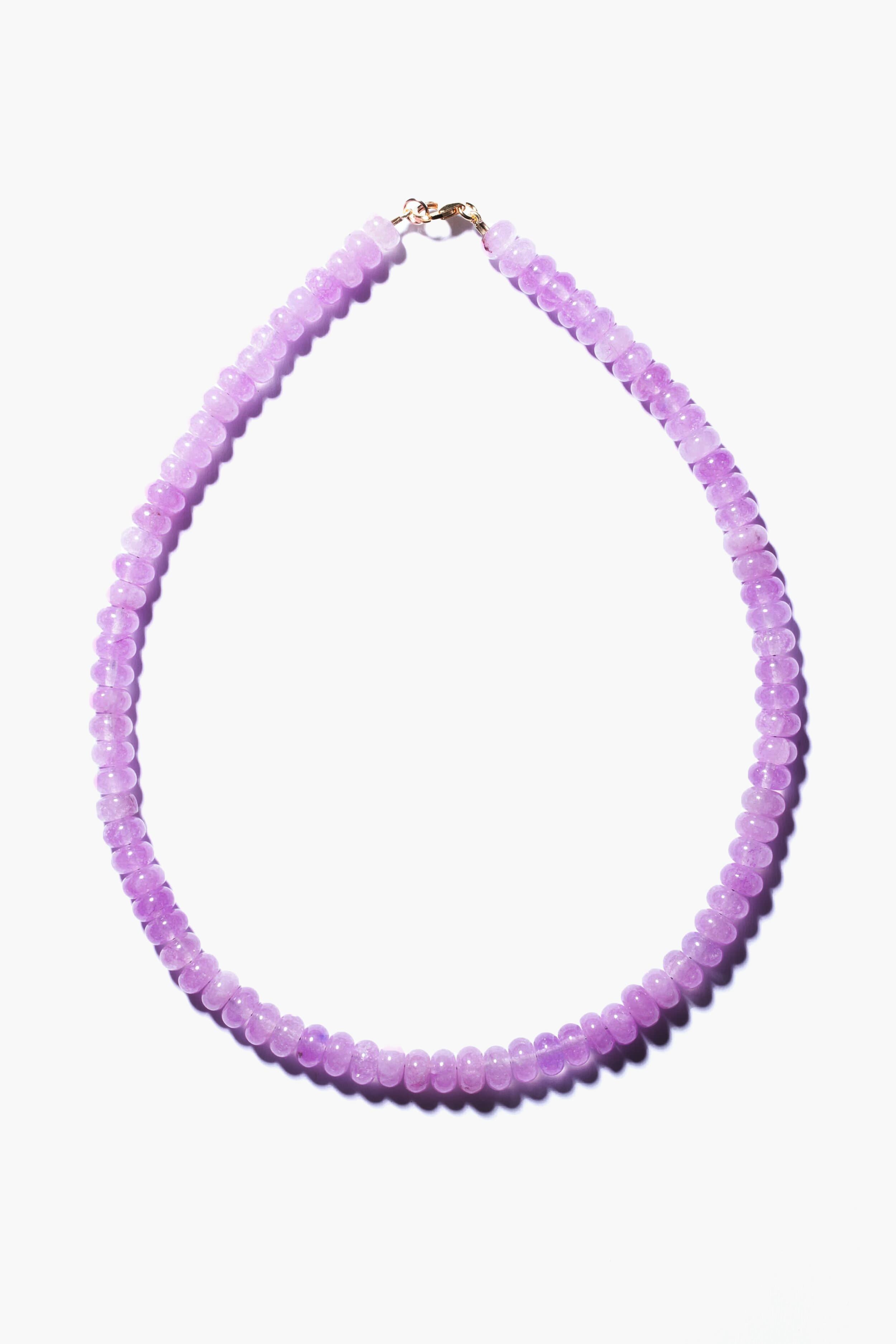 Theodosia necklace featuring round, translucent lavender beads and a gold-fill clasp, exemplifying handcrafted fine jewelry.