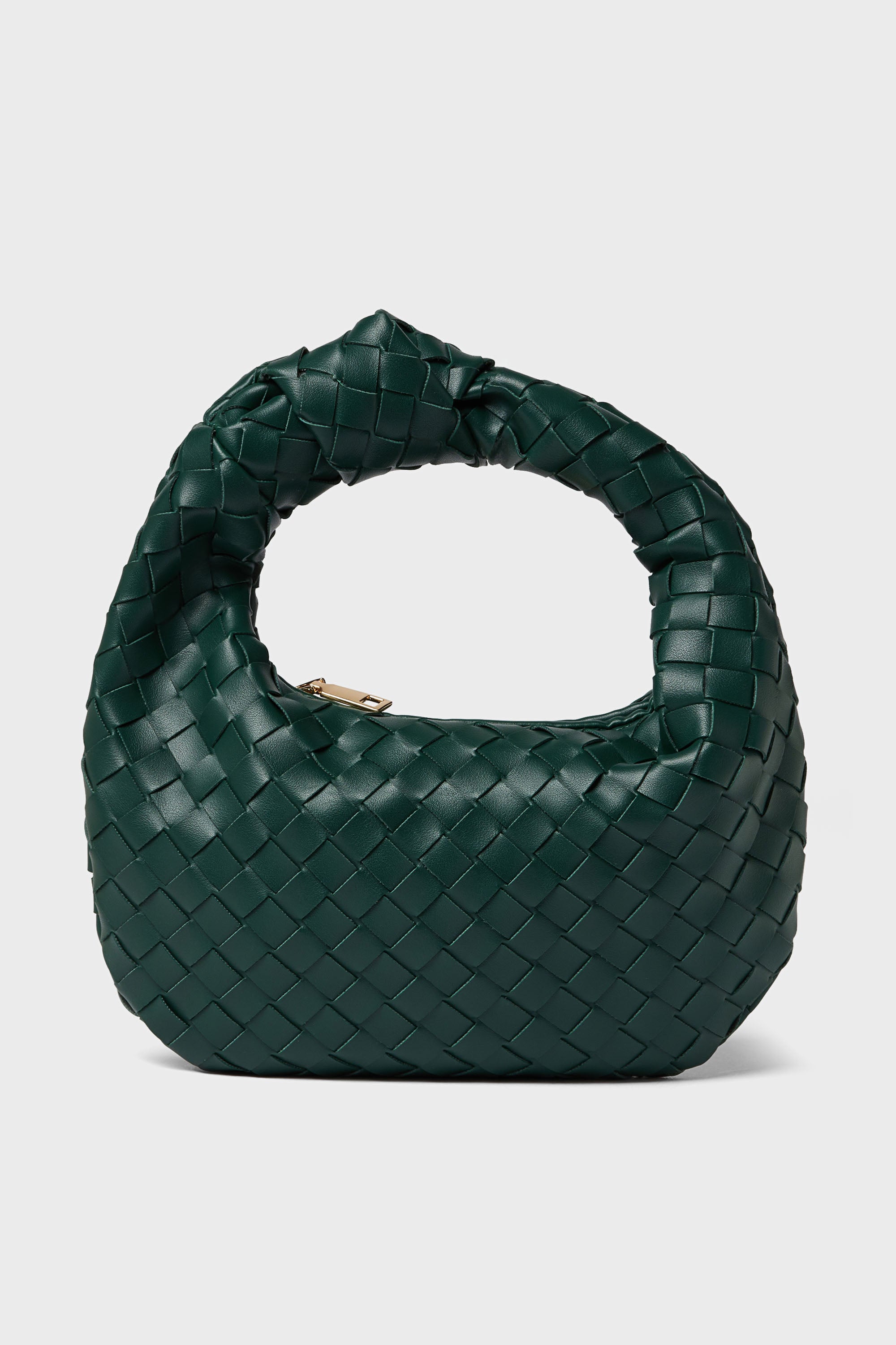 The Urban Expressions handbag is a dark green, rounded, woven vegan leather accessory with a short handle, offering a stylish and animal-friendly option.
