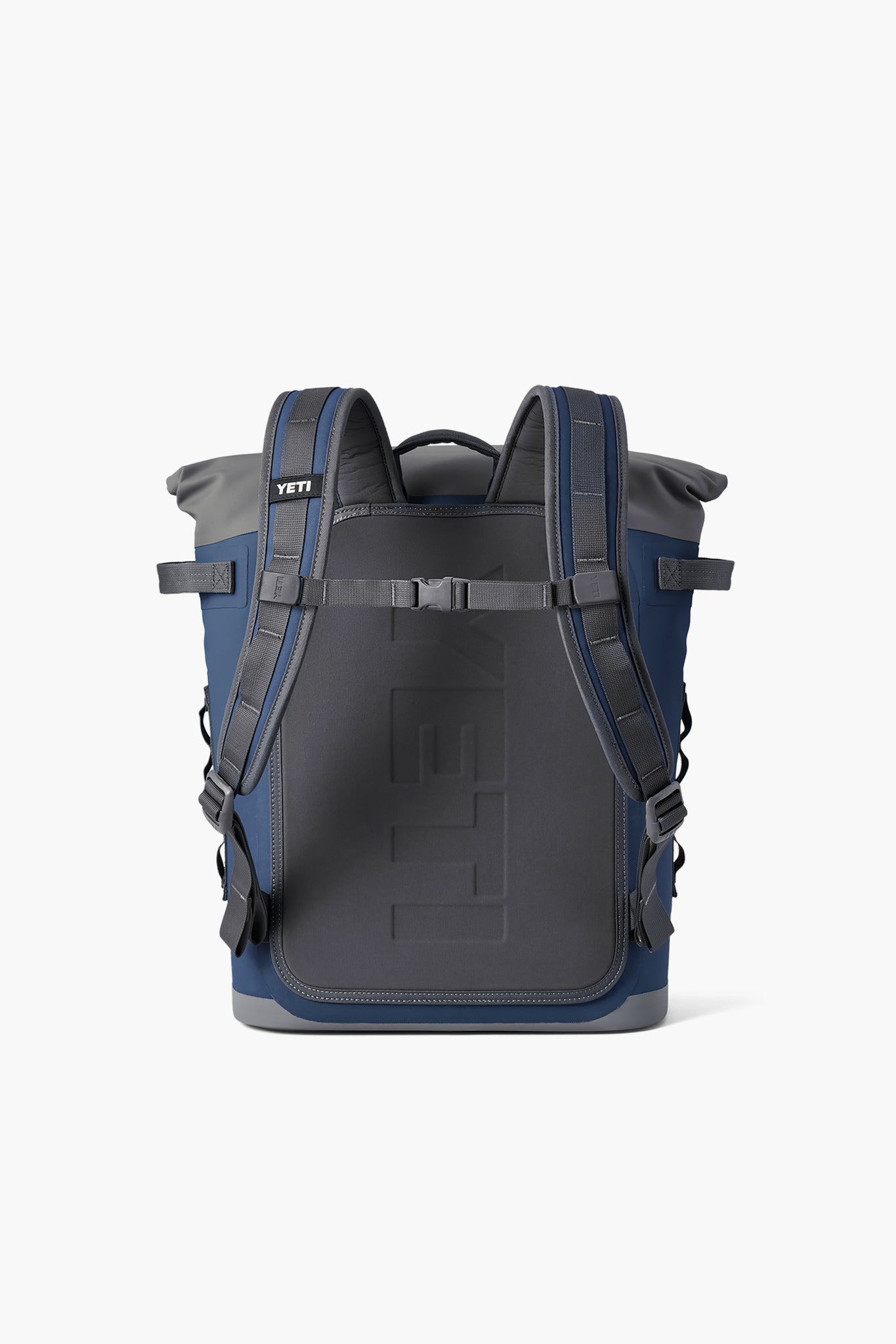 YETI Navy Hopper M20 Backpack features padded straps, sternum buckle, and molded back panel, offering a classic, effortless, and high-end cooling solution for fun outdoor adventures.