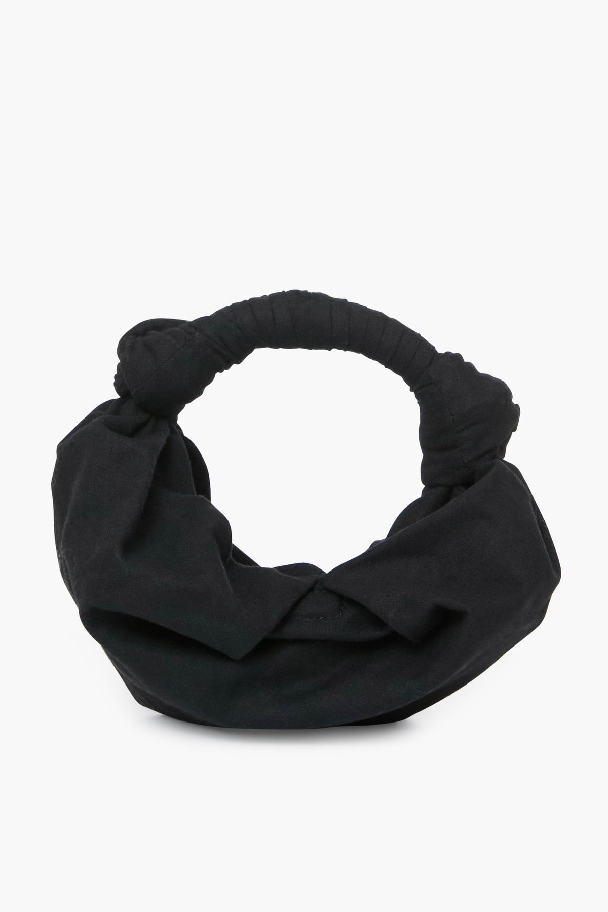 The Simon Miller Black Lopsy Bag is a chic, black fabric knot handle purse with a soft, rounded shape—perfect for any occasion.