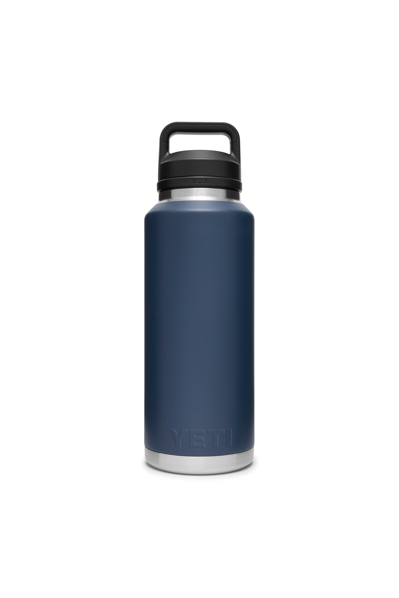 A YETI Rambler Bottle in matte dark blue with double-wall vacuum insulation and a black screw-on lid with handle, shown standing upright.