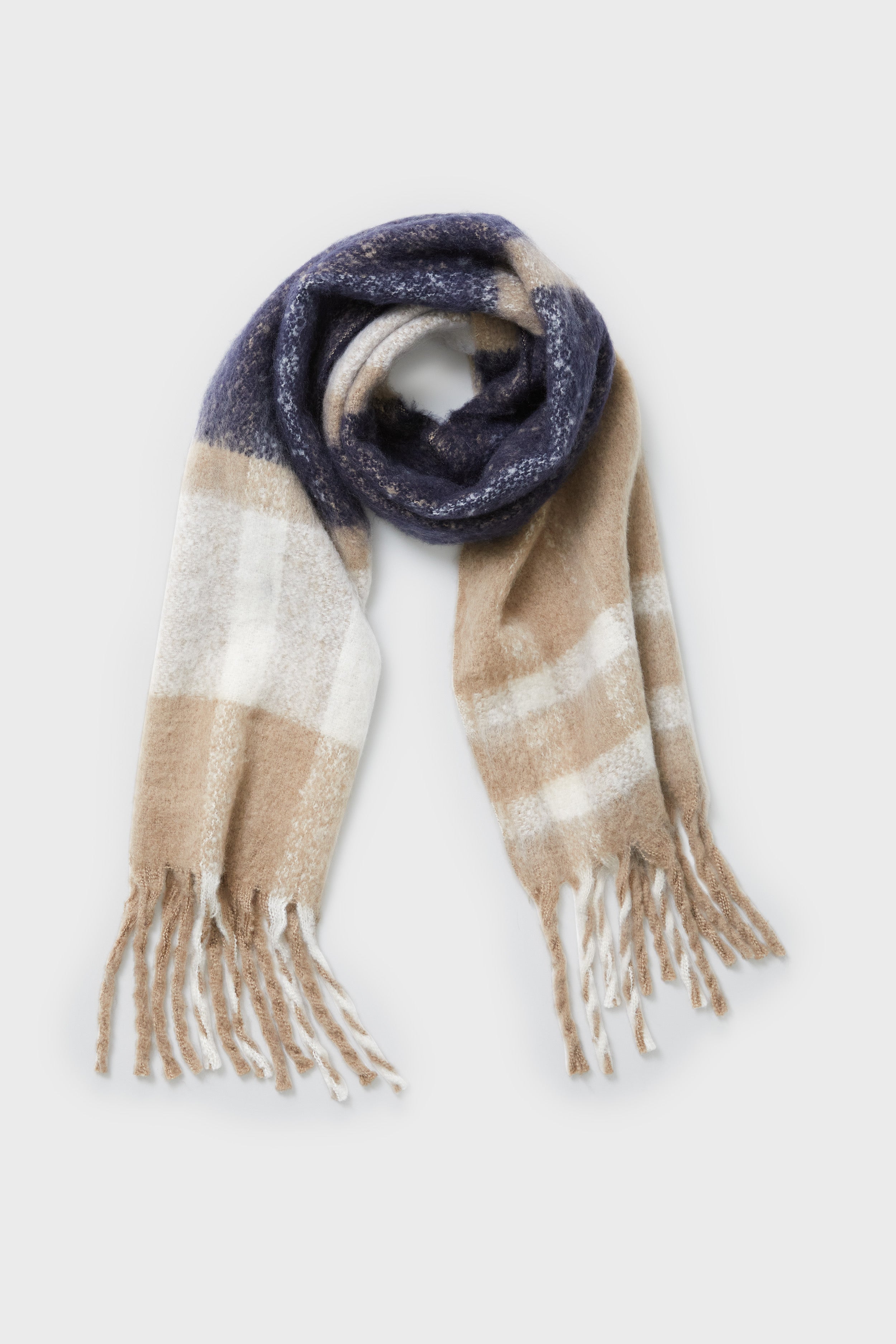 A Barbour scarf with a beige, white, and navy blue tartan plaid pattern features fringed ends and is displayed flat.