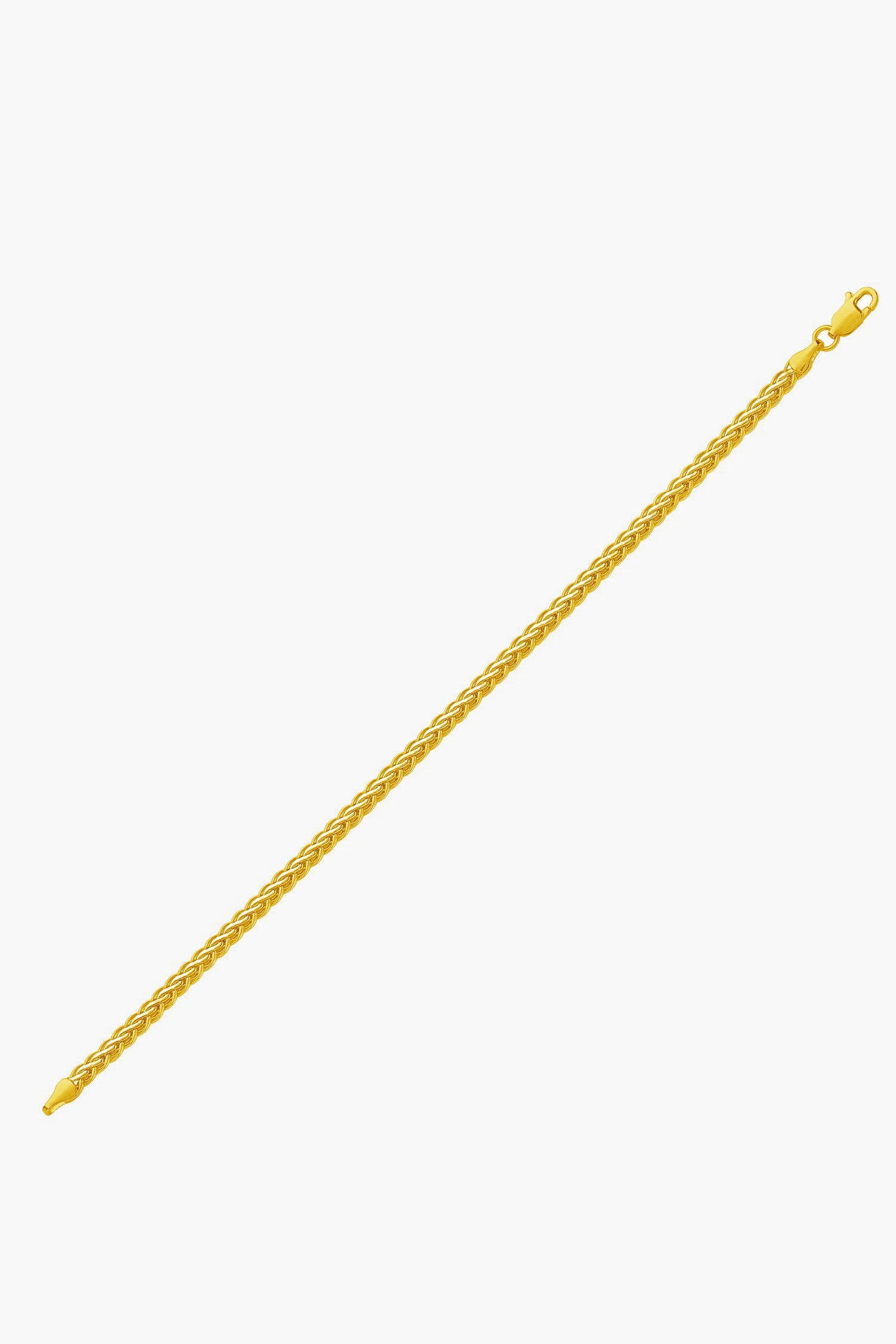 A 14k yellow gold wheat link chain bracelet with a lobster clasp from Tuckernuck Fine Jewelry.