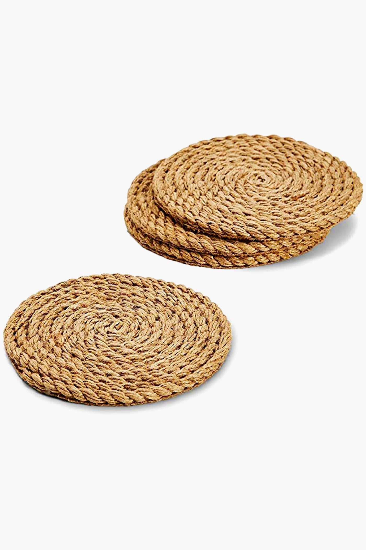Four round, woven jute coasters from Two's Company, crafted from natural fibers, are arranged in two stacks—ideal for protecting your surfaces with stylish flair.