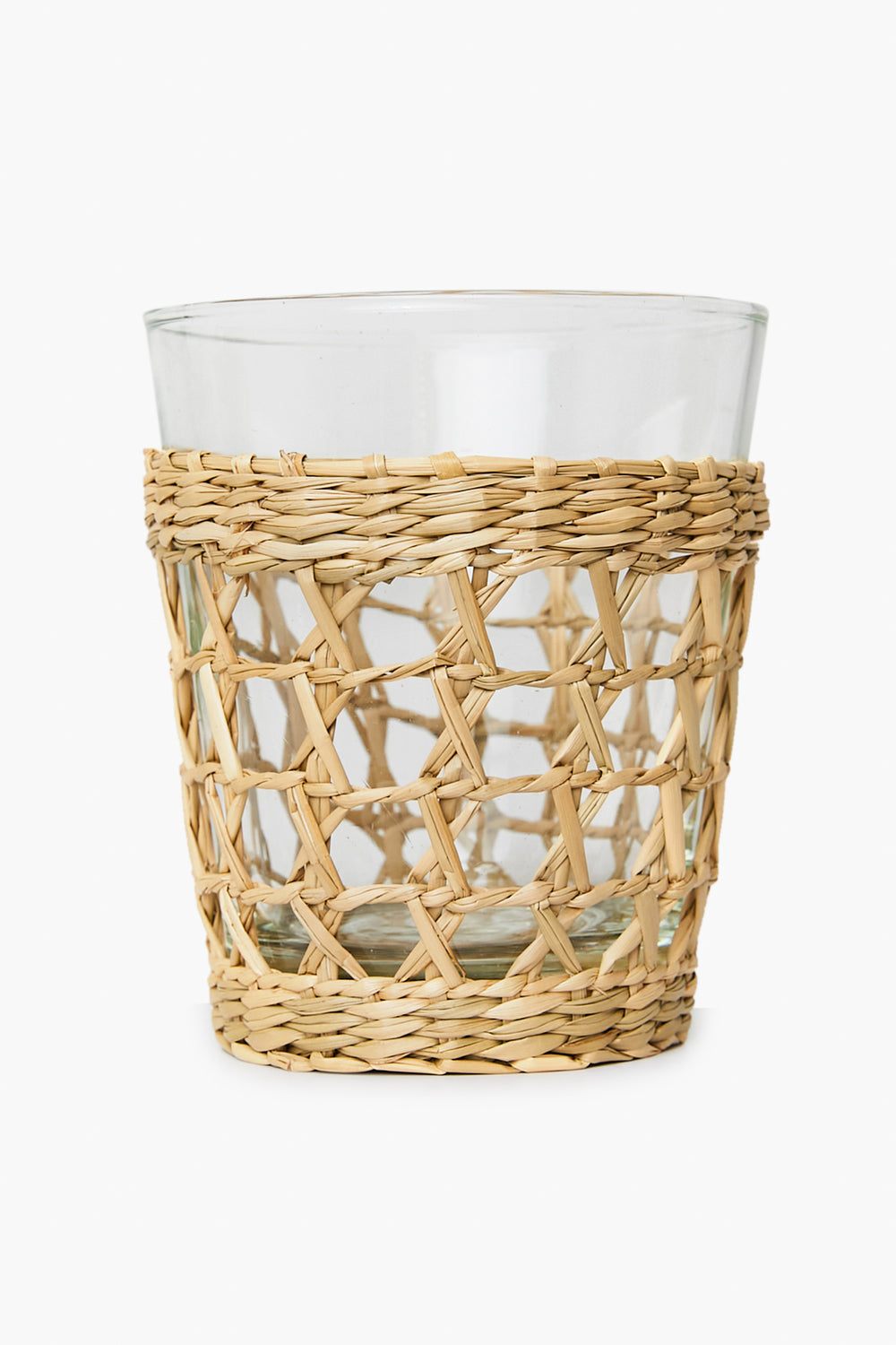 The Seagrass tumbler features a clear glass design with an outer woven wicker sleeve, adding a coastal decor touch to your table.