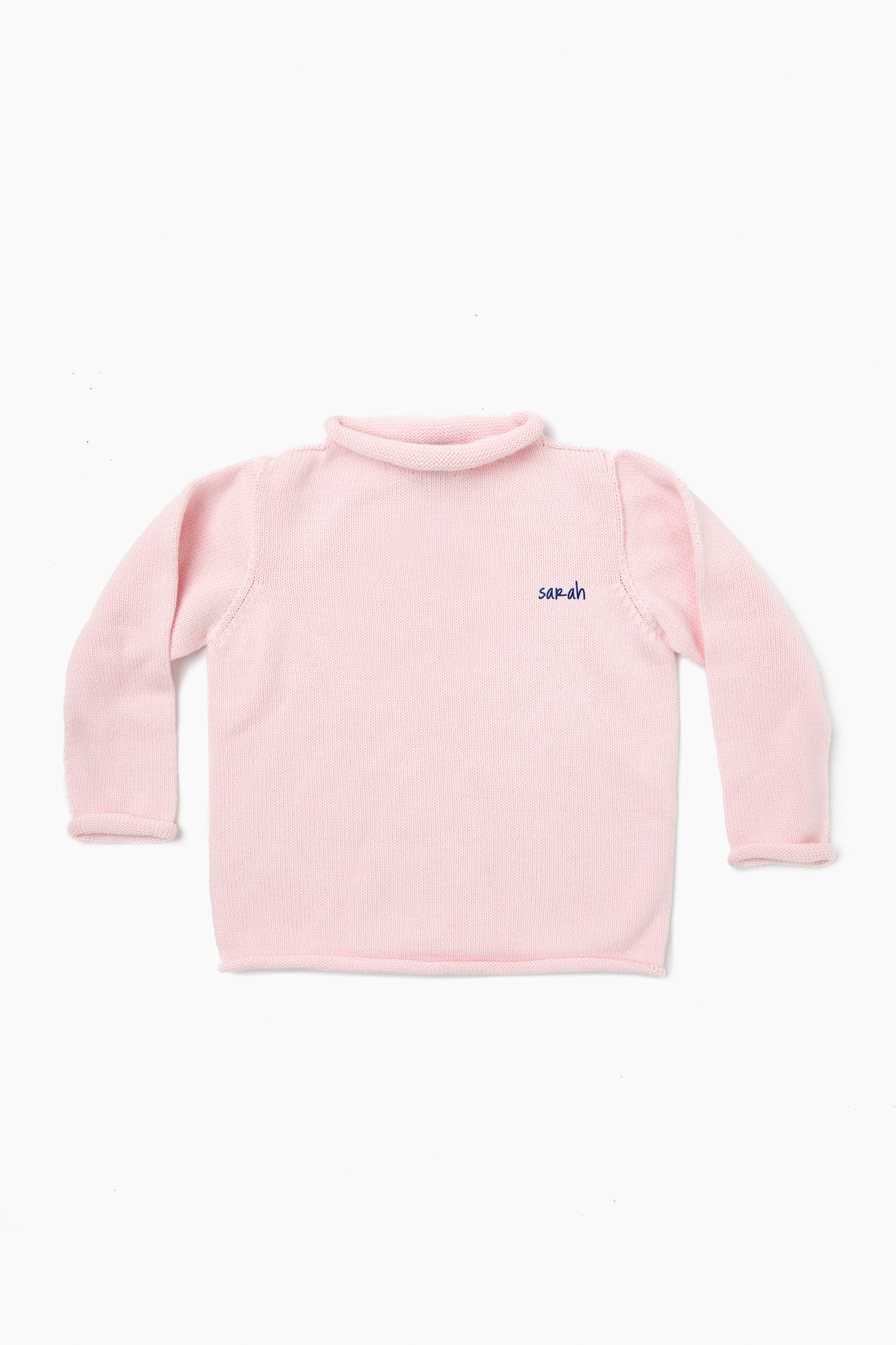A Soft Idea light pink long-sleeve fleece shirt with a small blue "sarah" monogram embroidered on the left chest, shown laid flat.