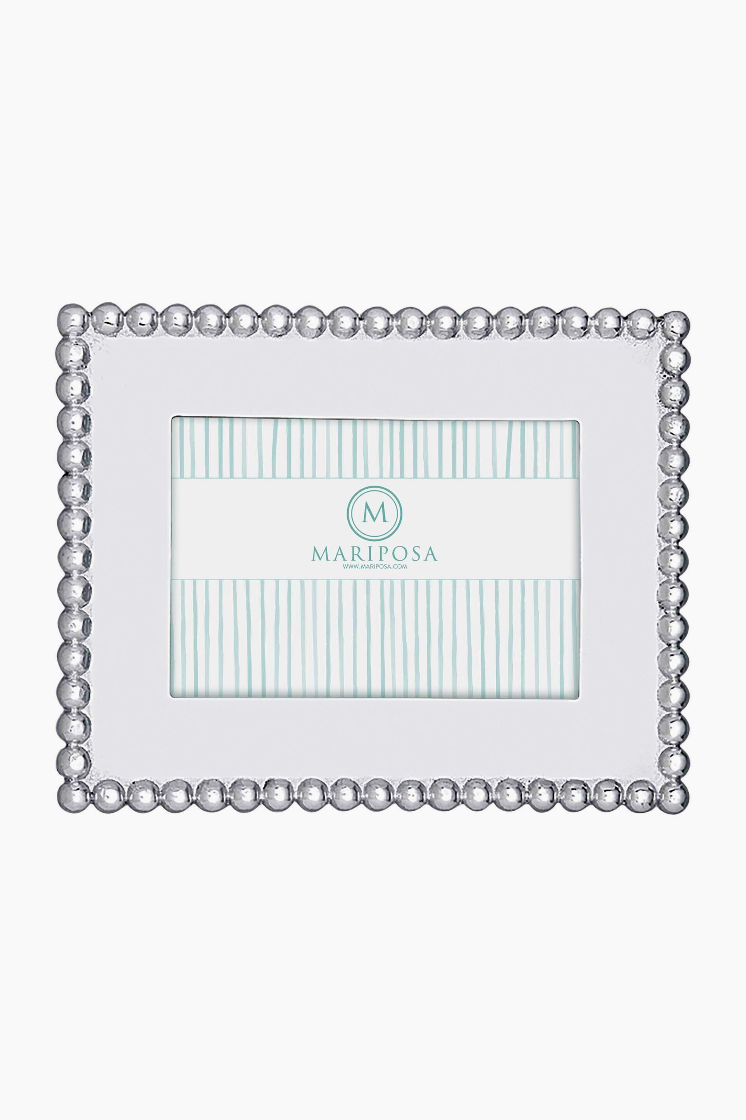 Mariposa rectangular 4x6 picture frame crafted from recycled aluminum, featuring a raised silver bead border and a blue-striped placeholder insert with the Mariposa logo at the center.