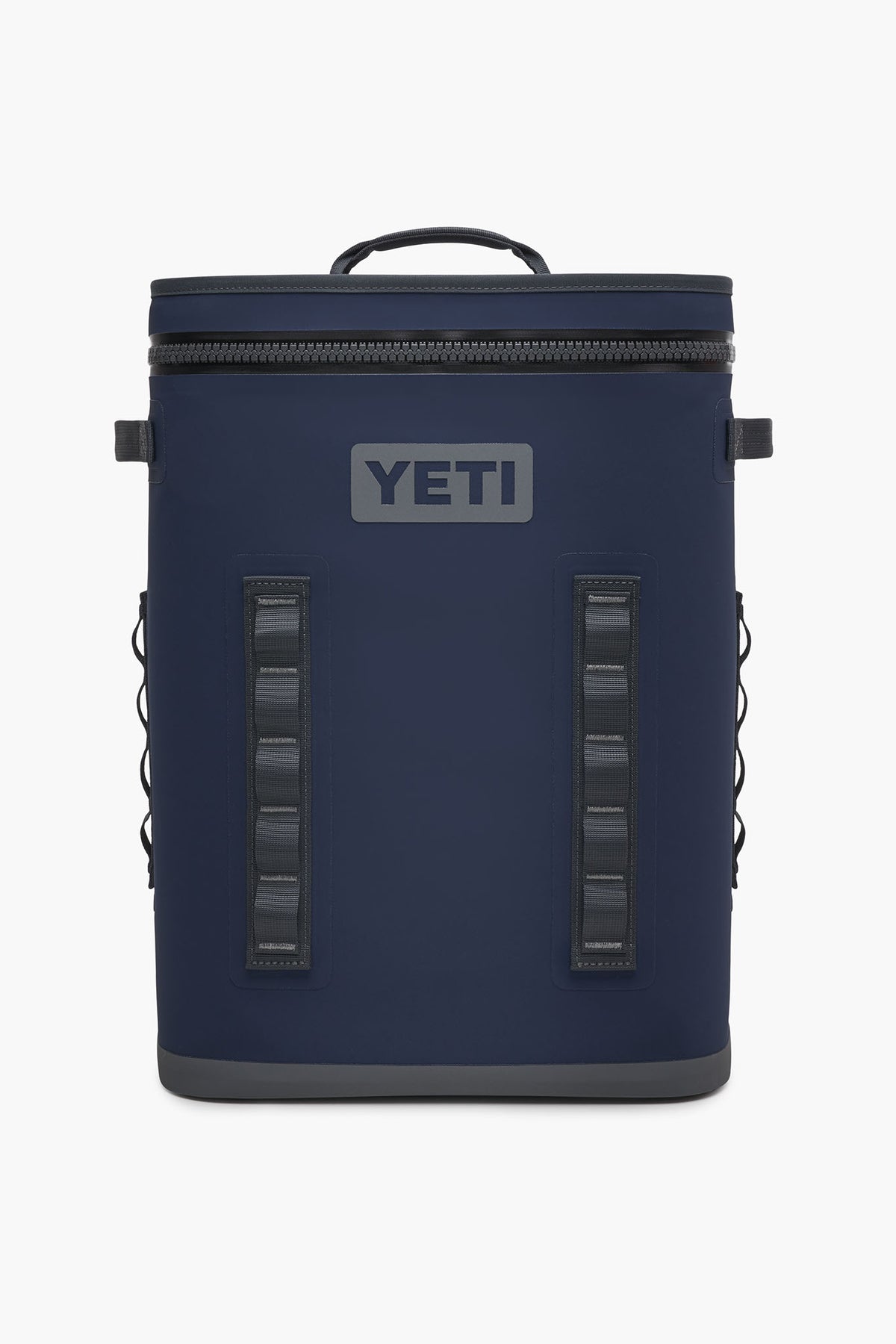 The YETI Hopper BackFlip is a navy blue backpack cooler featuring a top handle, front zipper, side loops, and the YETI logo. Designed by YETI for portability and durability, this leakproof cooler is perfect for on-the-go use.