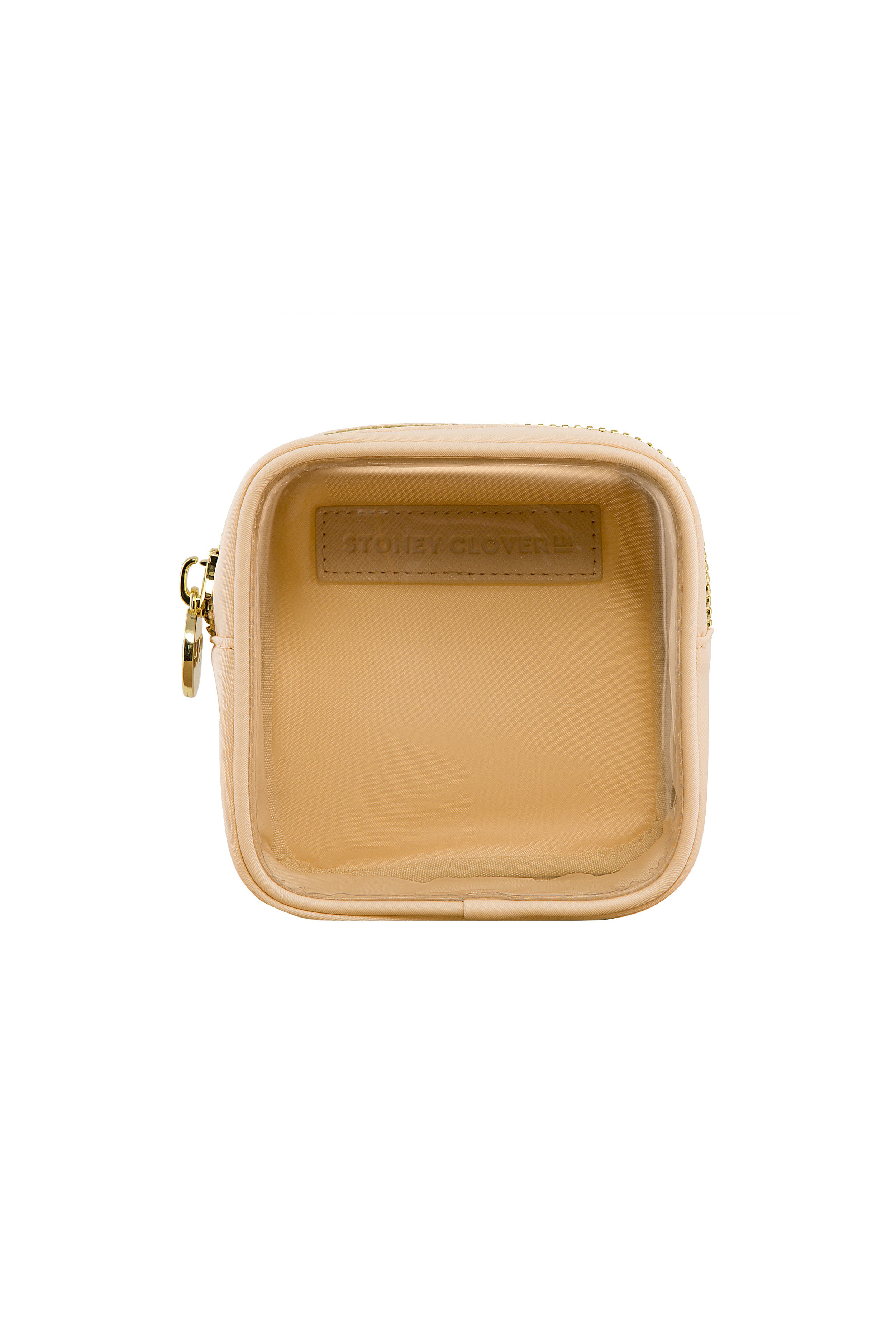A small, square, beige Stoney Clover Lane makeup bag with a zippered closure and empty interior, shown from above.