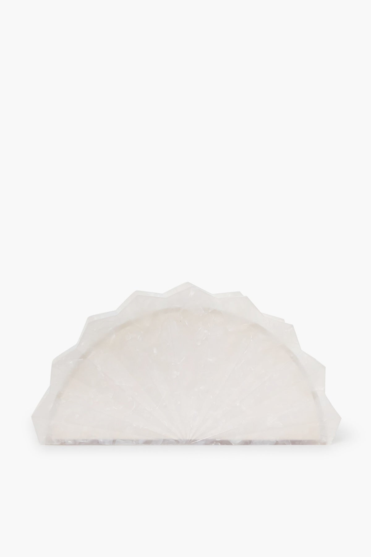 The Cult Gaia Esme Clutch is a white, semi-circular, fan-shaped bag with a textured surface made from pearlized acrylic, designed to resemble a decorative or functional household item.