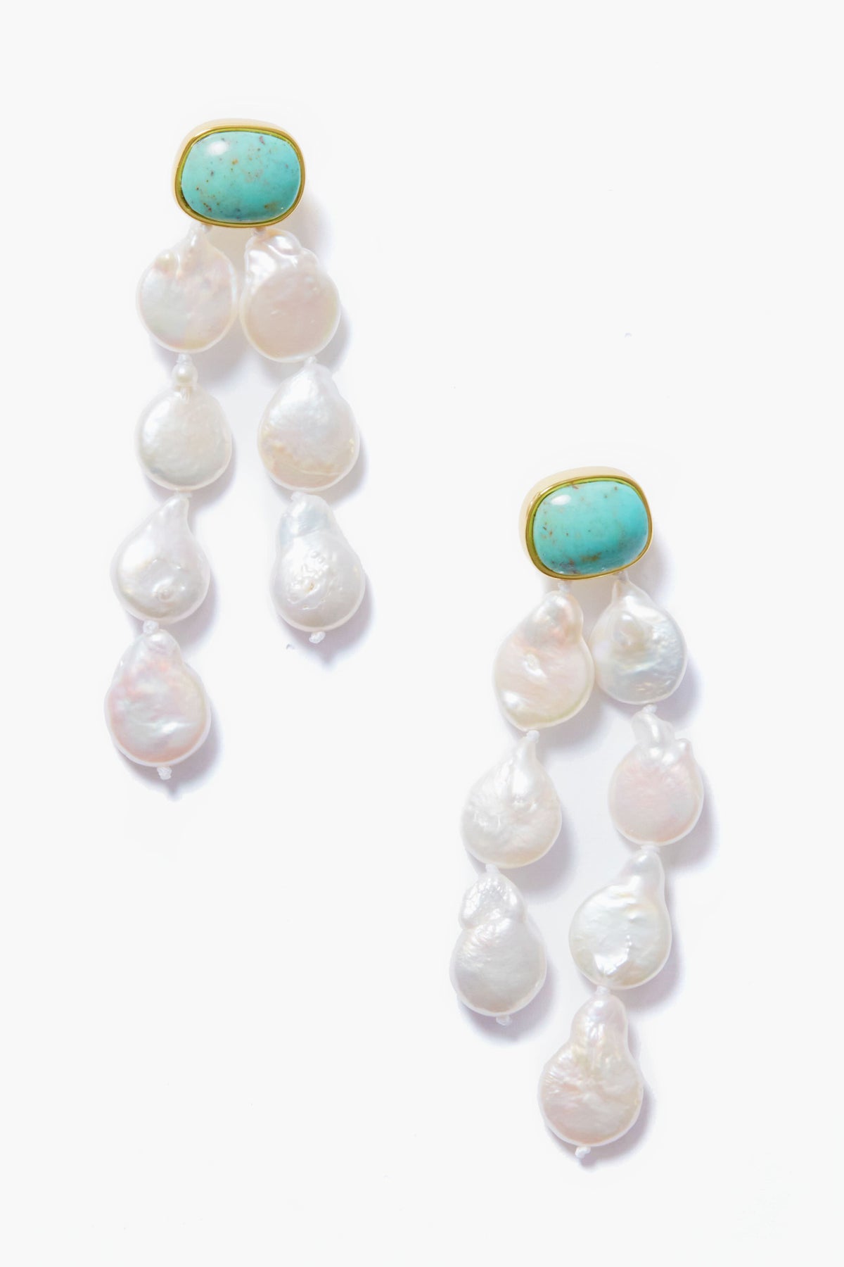 A pair of turquoise earrings by Lizzie Fortunato with gold settings and clusters of irregular freshwater pearls.