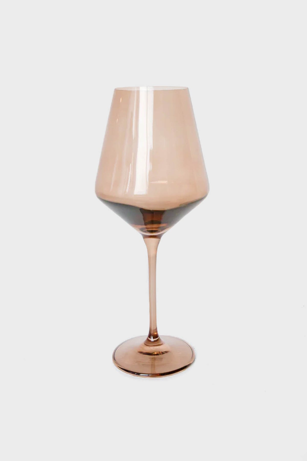 A single Estelle Colored Glass wine glass, vintage-inspired with a brown tint, wide bowl, and slender stem, expertly crafted from hand-blown colored glass.