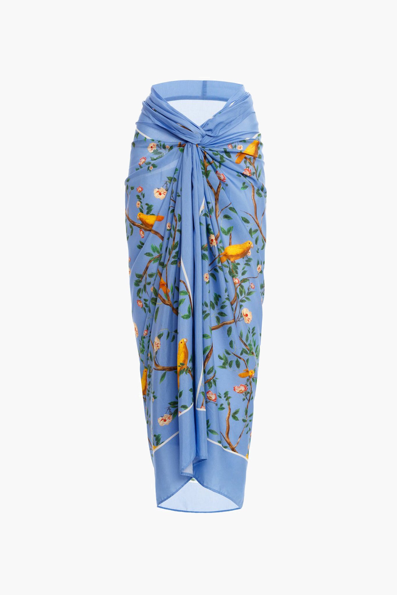 A blue cotton silk pareo by AGUA BY AGUA BENDITA, featuring a knotted front and vibrant bird-and-branch print, crafted by Colombian artisans.