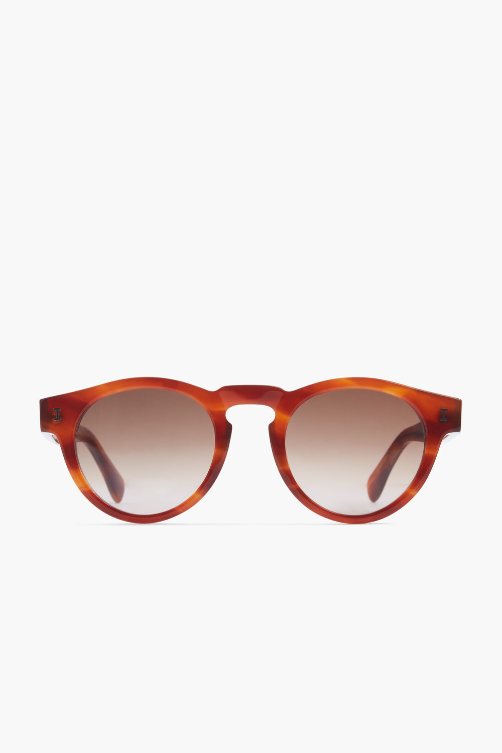 Handmade in Italy, the Illesteva Leonard sunglasses feature round, brown tortoiseshell acetate frames with gradient lenses.